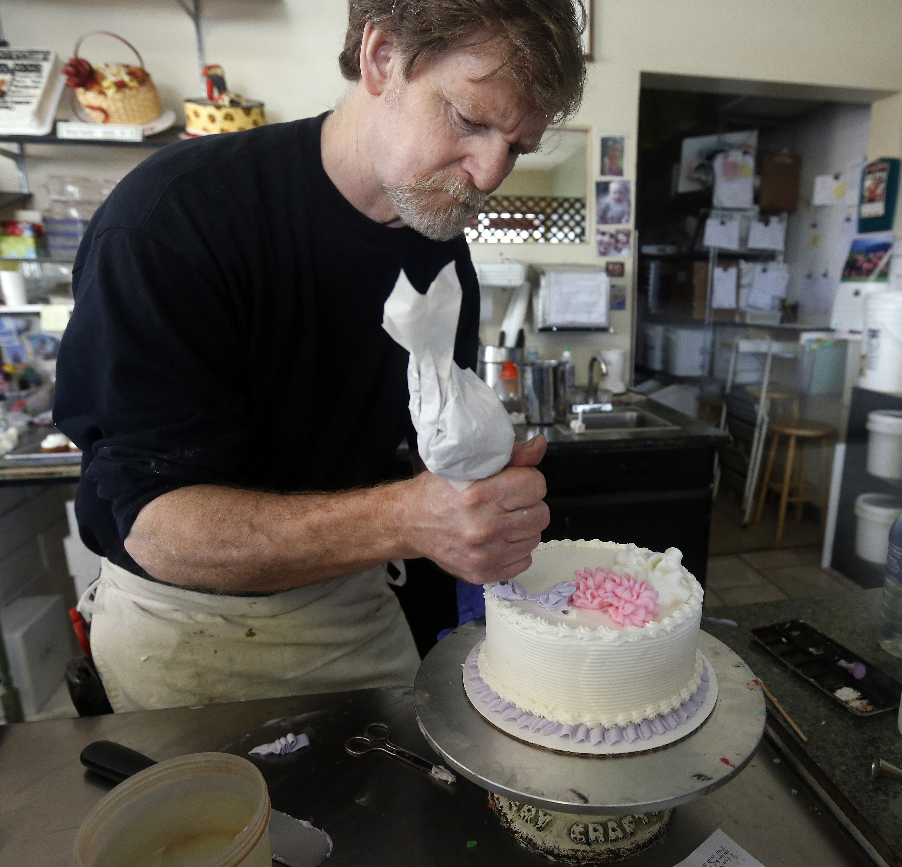 Masterpiece Cakeshop owner Jack Phillips decorates a cake inside his store, in Lakewood, Colorado, on March 14, 2010. (Brennan Linsley&mdash;AP)