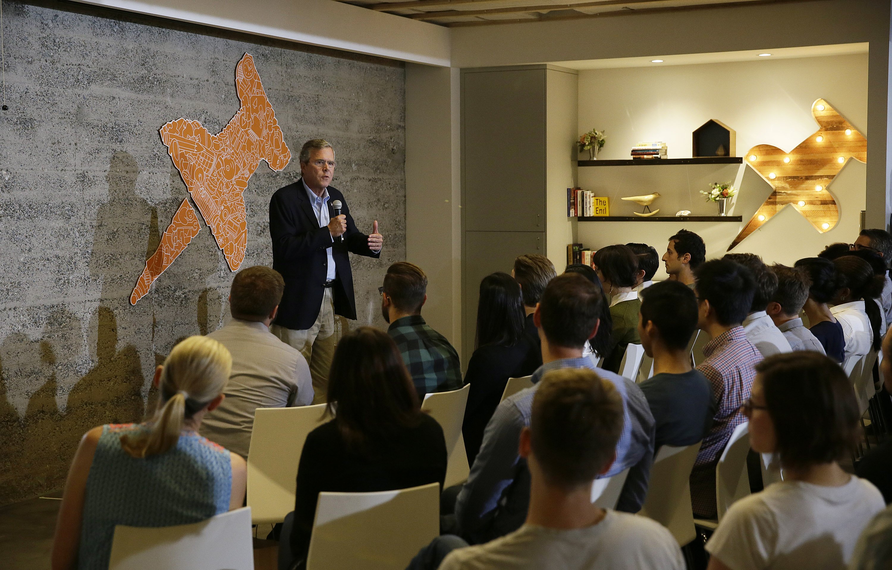 Republican presidential candidate, former Florida Gov. Jeb Bush, gestures while speaking to employees at Thumbtack, an online startup on July 16, 2015, in San Francisco. (Eric Risberg—AP)