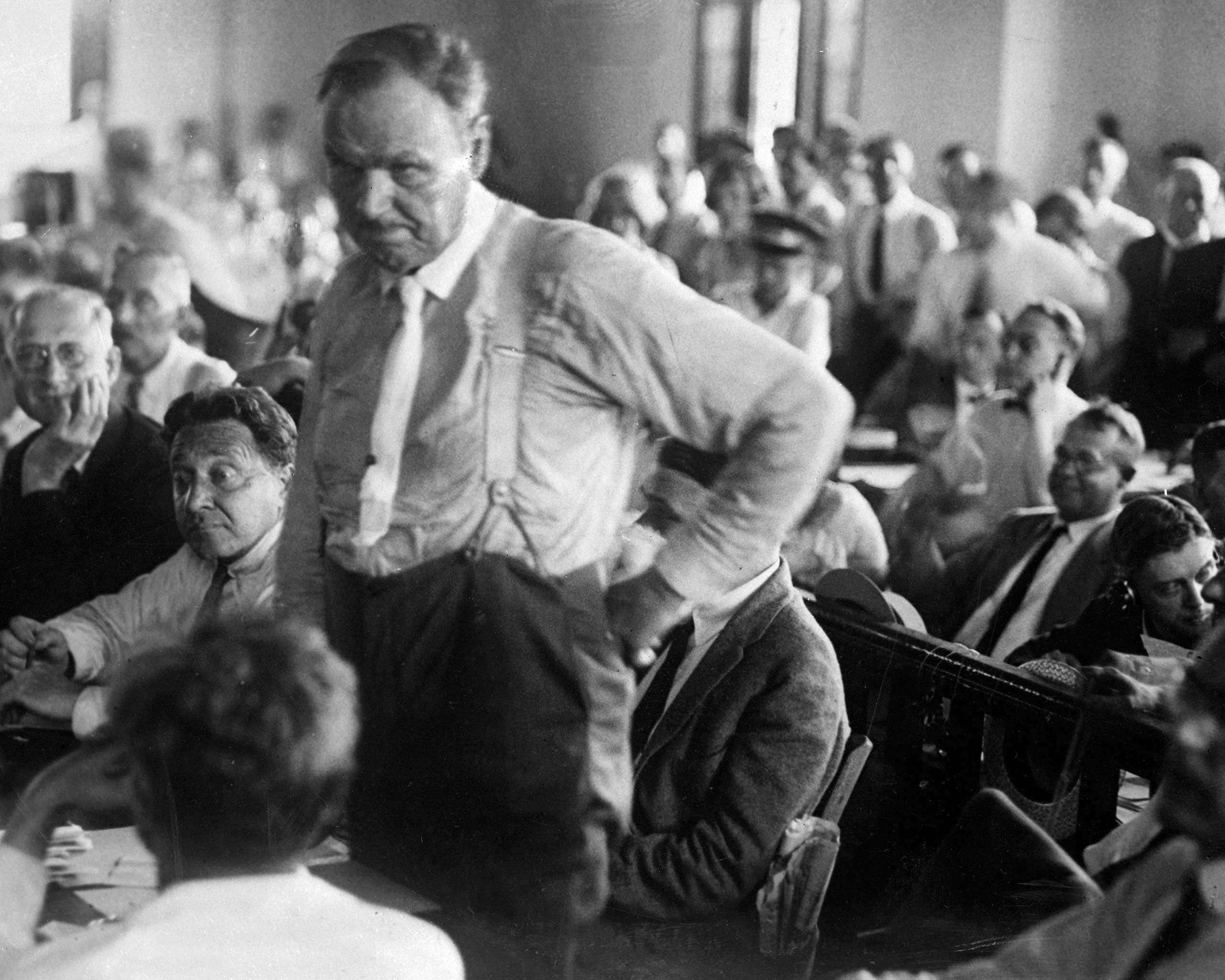 Attorney Clarence Darrow consults with Judge Raulston about procedure in the Tennessee courts during the trial of John T. Scopes. (New York Daily News/Getty Images)