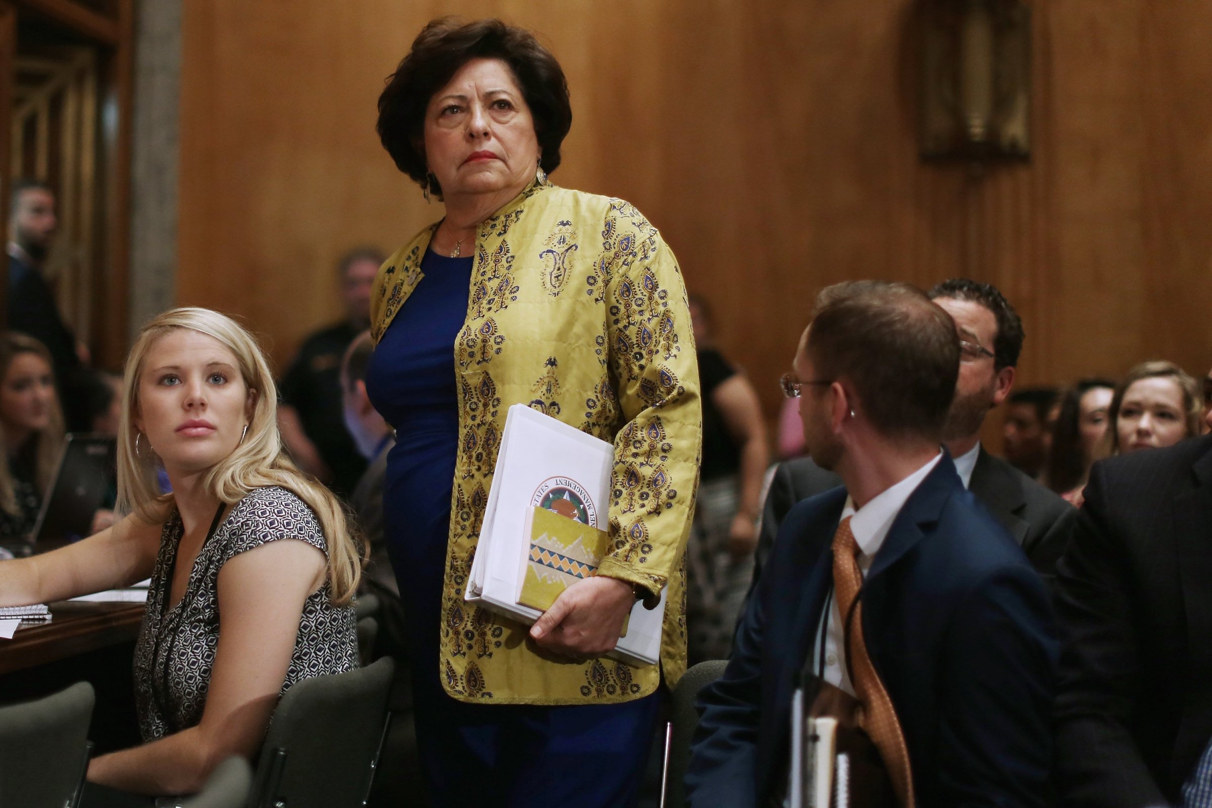 The Office of Personnel Management Director Katherine Archuleta arrives late for a hearing of the Senate Homeland Security and Governmental Affairs Committee about the recent OPM data breach in the Dirksen Senate Office Building on Capitol Hill June 25, 2015 in Washington.