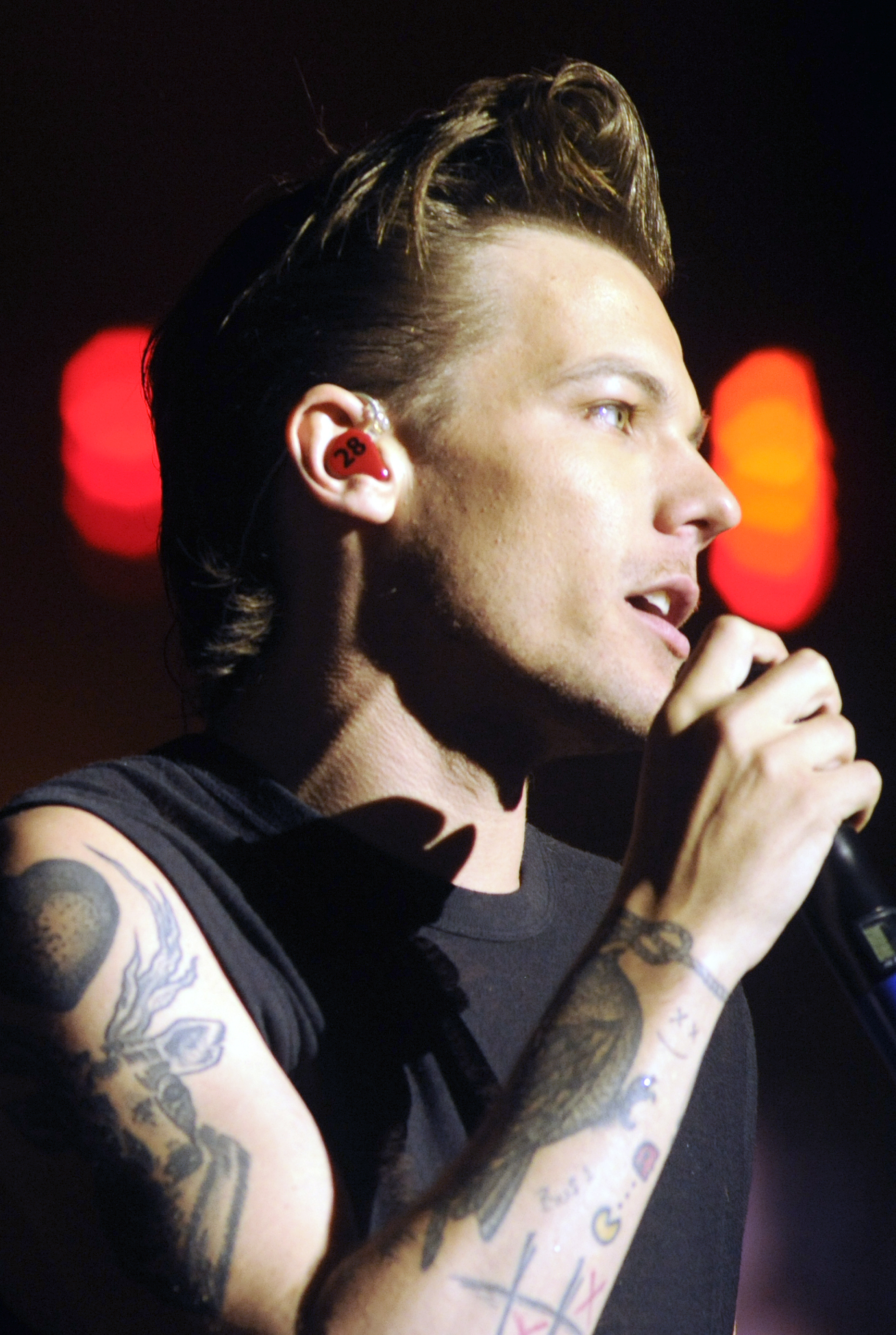 Louis Tomlinson of One Direction performs during the band's "On the Road Again" tour at Levi's Stadium on July 11, 2015 in Santa Clara, California.