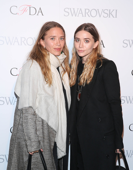 Mary-Kate Olsen (L) and Ashley Olsen at 2015 CFDA Fashion Awards Announcement Party in New York City on March 16, 2015.