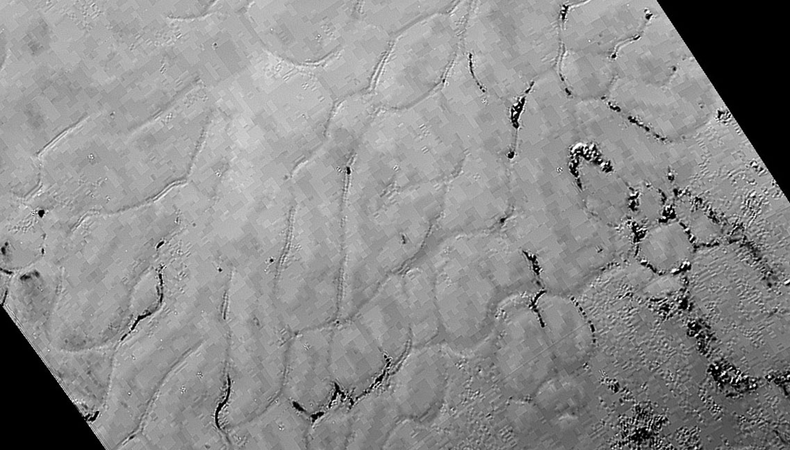 In the center left of Pluto’s vast heart-shaped feature – informally named “Tombaugh Regio” - lies a vast, craterless plain that appears to be no more than 100 million years old, and is possibly still being shaped by geologic processes. This frozen region is north of Pluto’s icy mountains and has been informally named Sputnik Planum (Sputnik Plain), after Earth’s first artificial satellite. The image was acquired on July 14 from a distance of 48,000 miles (77,000 kilometers).