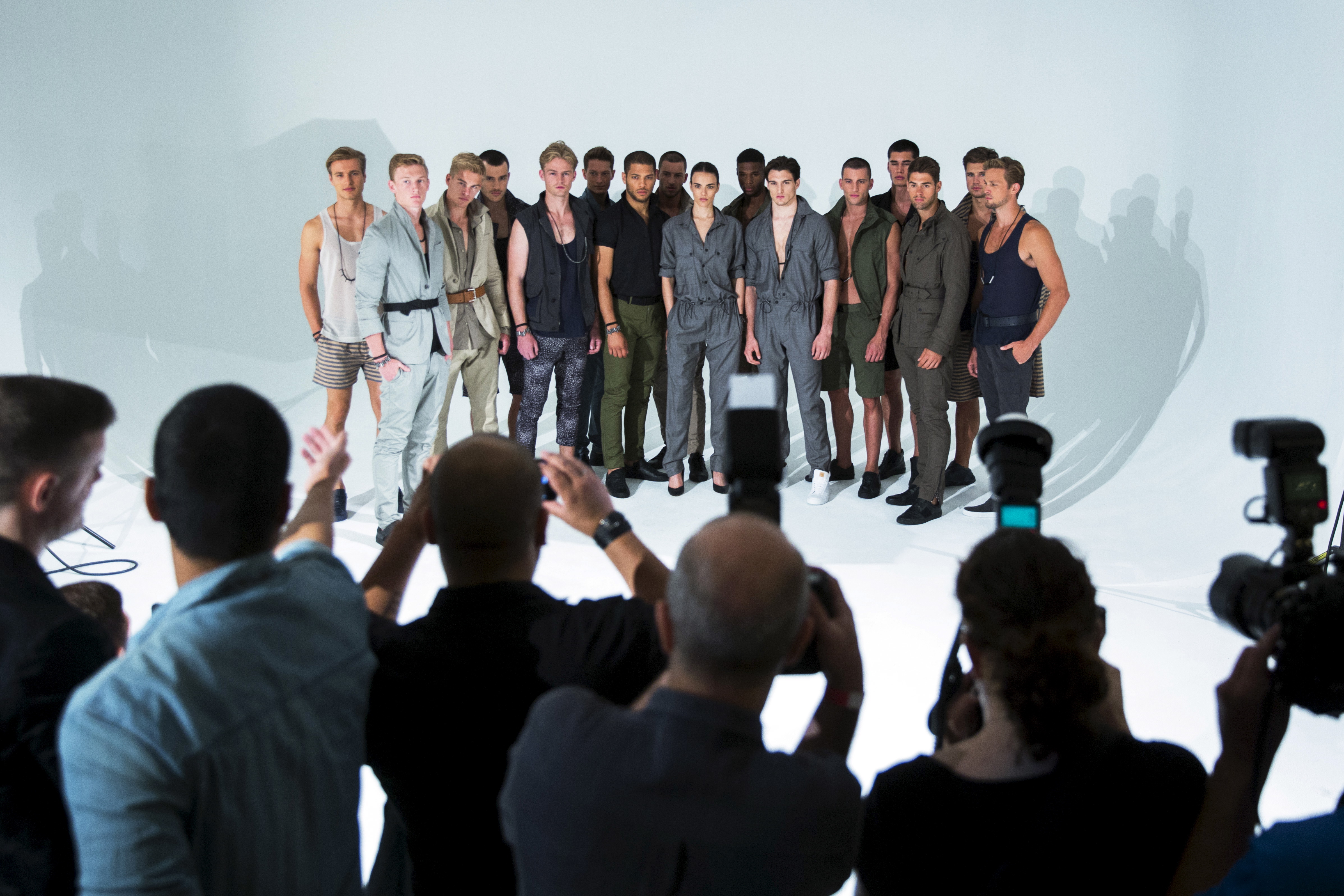 Models stand on stage for the Cadet presentation during Men's Fashion Week, in New York