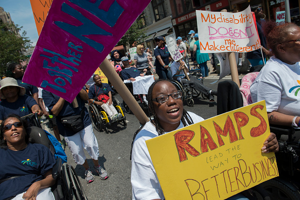 People participate in the first annual Disability Pride Parade  in New York City on July 12, 2015. (Stephanie Keith—Getty Images)
