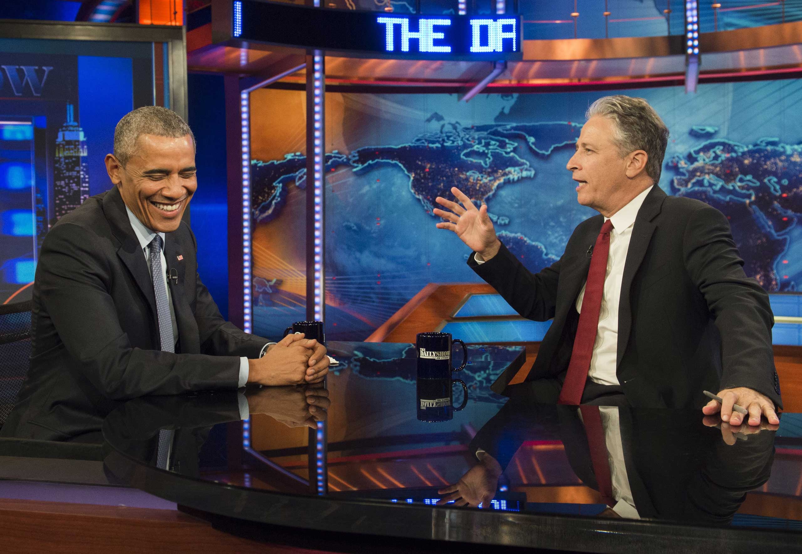 US President Barack Obama speaks with Jon Stewart, host of "The Daily Show with Jon Stewart," during a taping of the show in New York, July 21, 2015. (Saul Loeb—AFP/Getty Images)