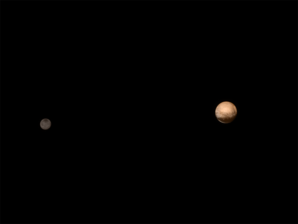 New Horizons was about 3.7 million miles (6 million kilometers) from Pluto and Charon when it snapped this portrait late on July 8, 2015. Color information obtained earlier in the mission from the Ralph instrument has been added. (NASA-JHUAPL-SWRI)