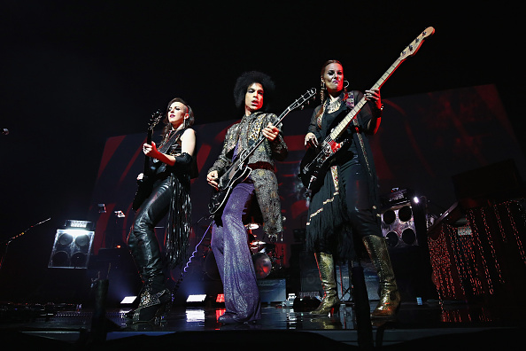 Prince performs onstage with 3RDEYEGIRL during his "HitnRun" tour in Montreal, Canada on May 23, 2015.