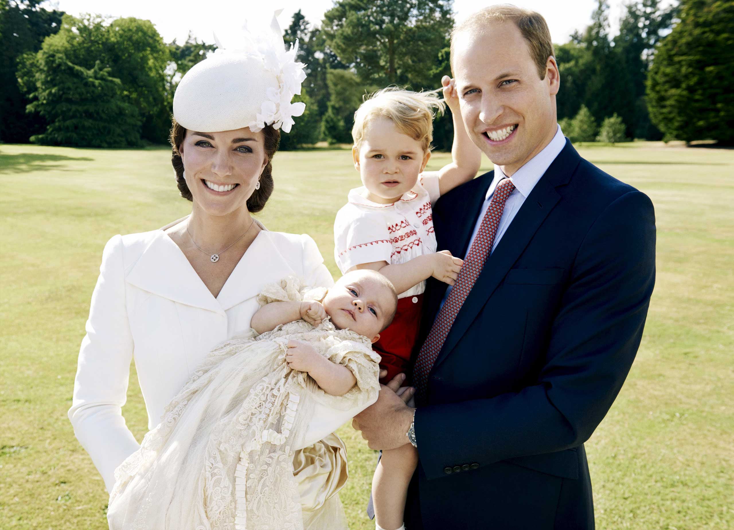Britain's Prince William and Catherine, the Duchess of Cambridge, with their children, Prince George and Princess Charlotte, who was christened at Sandringham, United Kingdom.