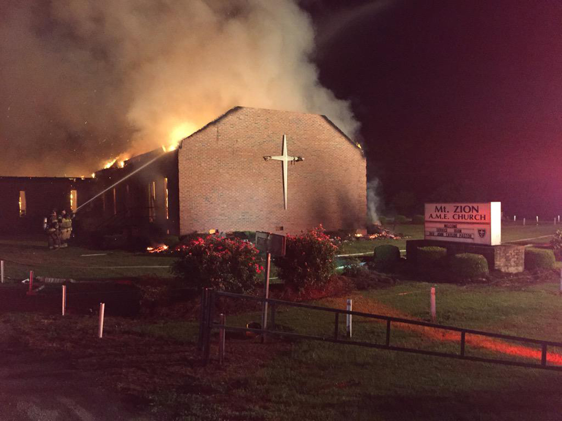Fire crews try to control a blaze at the Mt. Zion African Methodist Episcopal Church in Greeleyville, S.C., on the night of June 30, 2015 (Clarendon County Fire Department/Reuters)