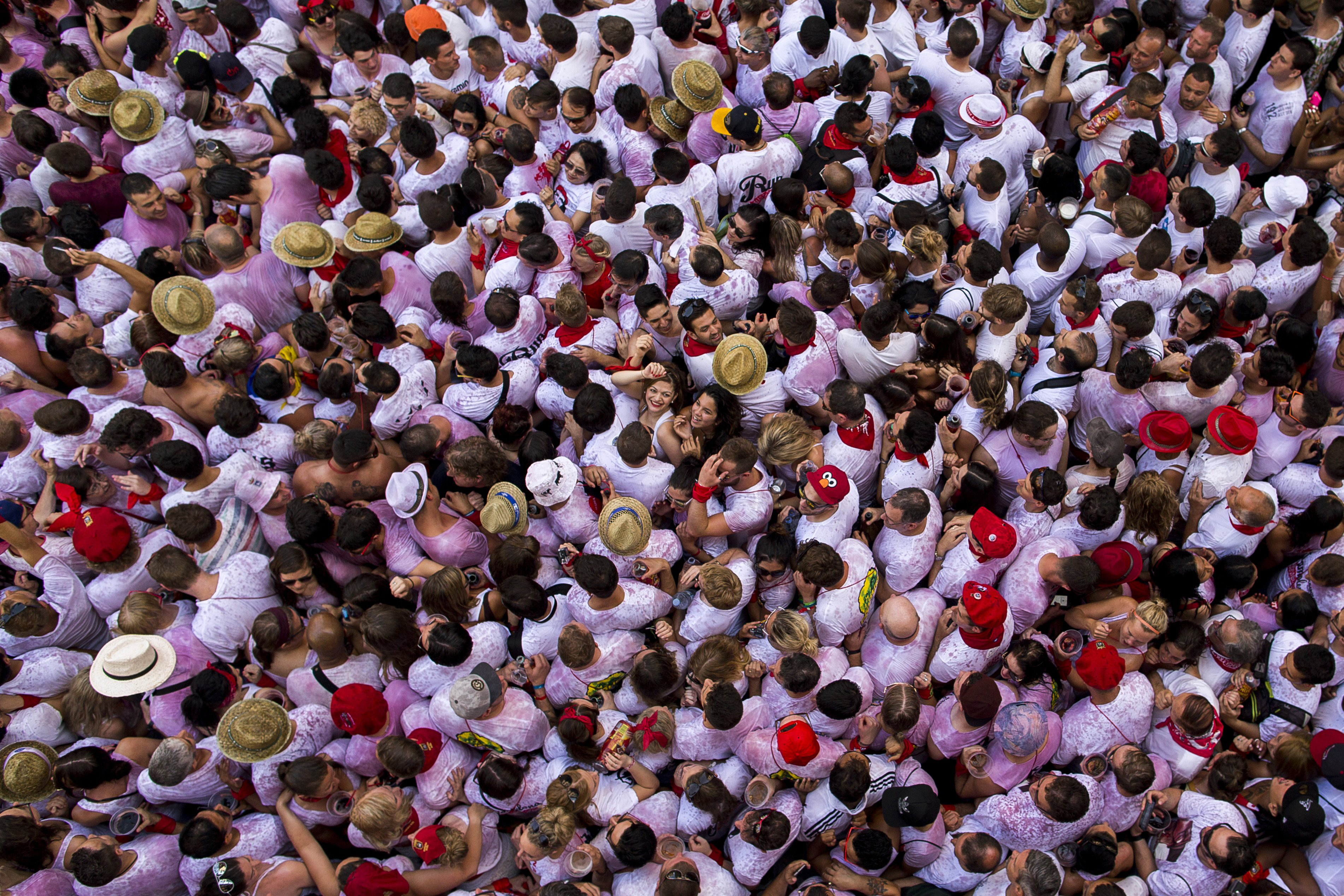 Revelers pack the Pamplona town square during the official opening of the 2015 San Fermin fiestas in Pamplona, Spain on July 6, 2015.