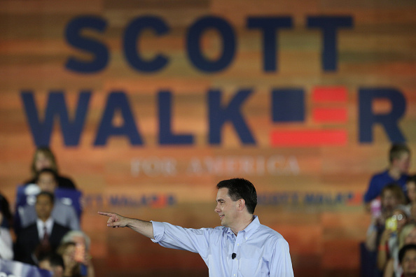 Scott Walker, governor of Wisconsin, takes the stage during his presidential campaign announcement in Waukesha, Wisconsin, U.S., on Monday, July 13, 2015.