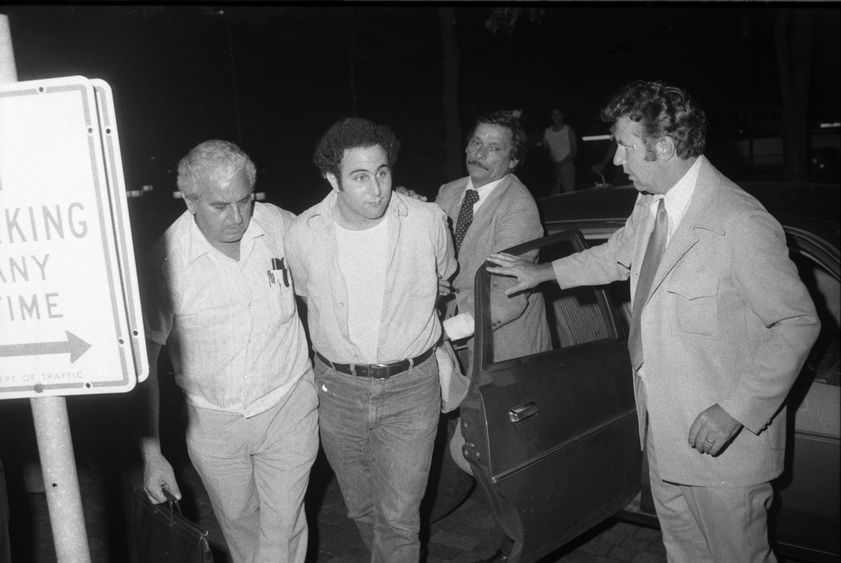 Police escort handcuffed Son of Sam suspect David Berkowitz into Police headquarters in lower Manhattan (New York Daily News Archive / Getty Images)