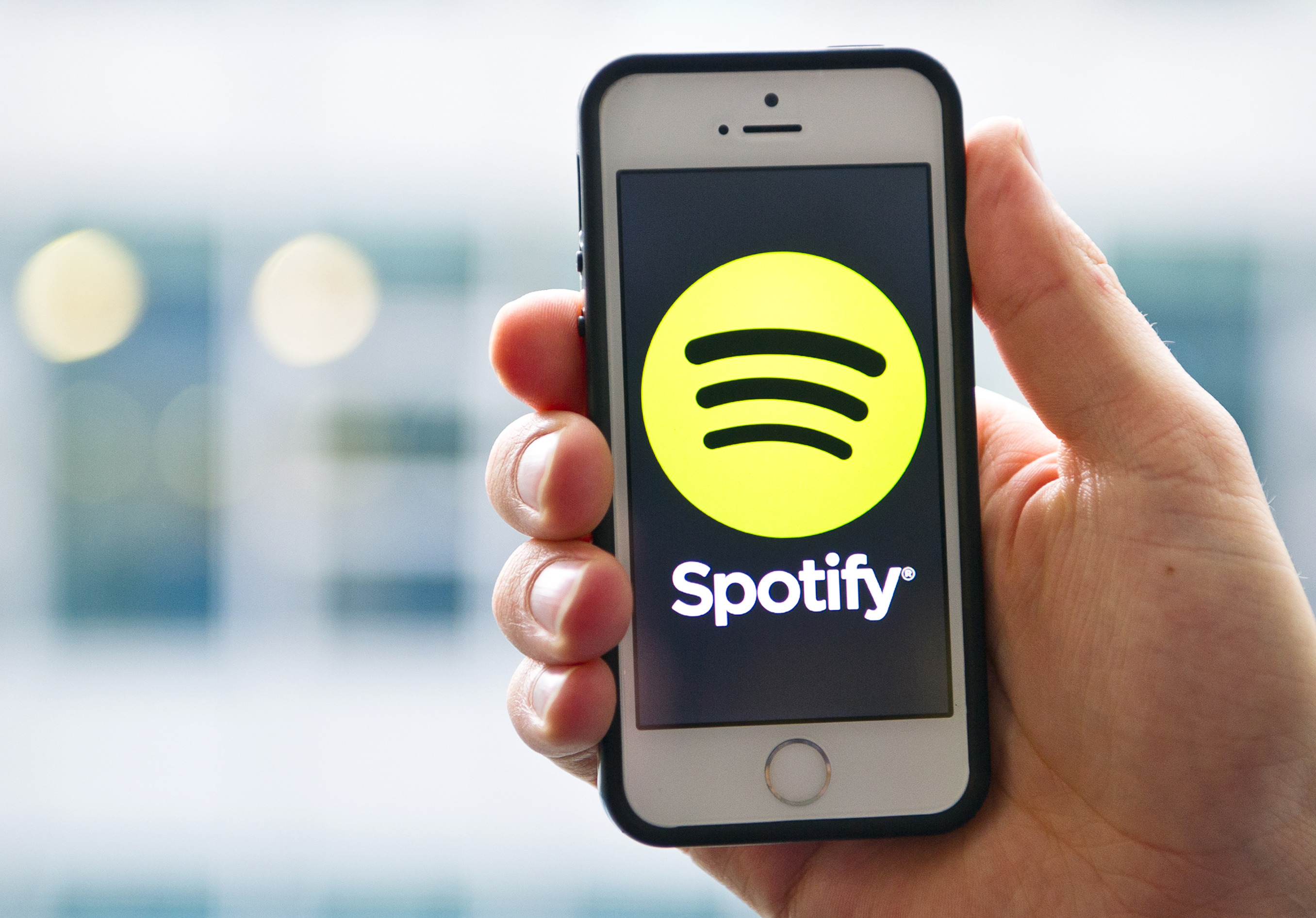 Spotify logo displayed on an iPhone. (Daniel Bockwoldt—picture-alliance/dpa/AP Images)