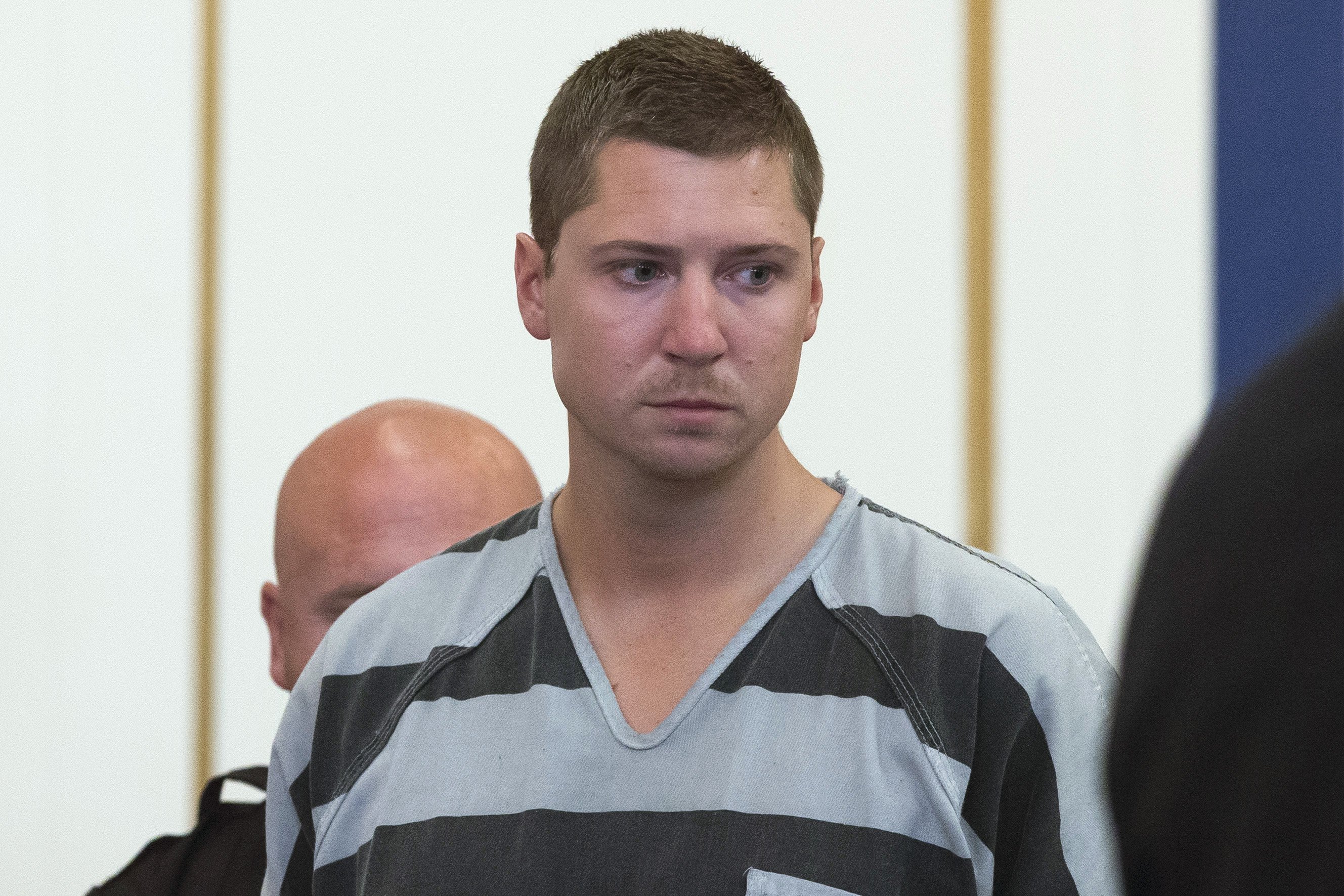 Former University of Cincinnati police officer Ray Tensing appears at Hamilton County Courthouse for his arraignment in the shooting death of motorist Samuel DuBose on July 30, 2015, in Cincinnati. (John Minchillo—AP)