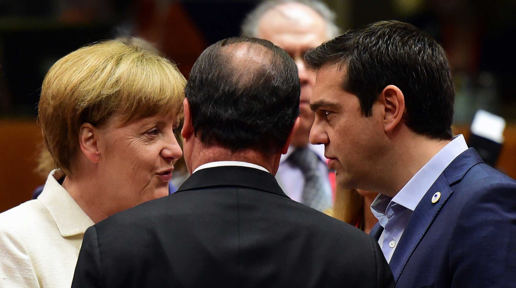 From left: German Chancellor Angela Merkel, French President Francois Hollande, and Greek Prime Minister Alexis Tsipras confer prior to the start of a summit of Eurozone heads of state in Brussels on July 12, 2015. (John MacDougall—AFP/Getty Images)