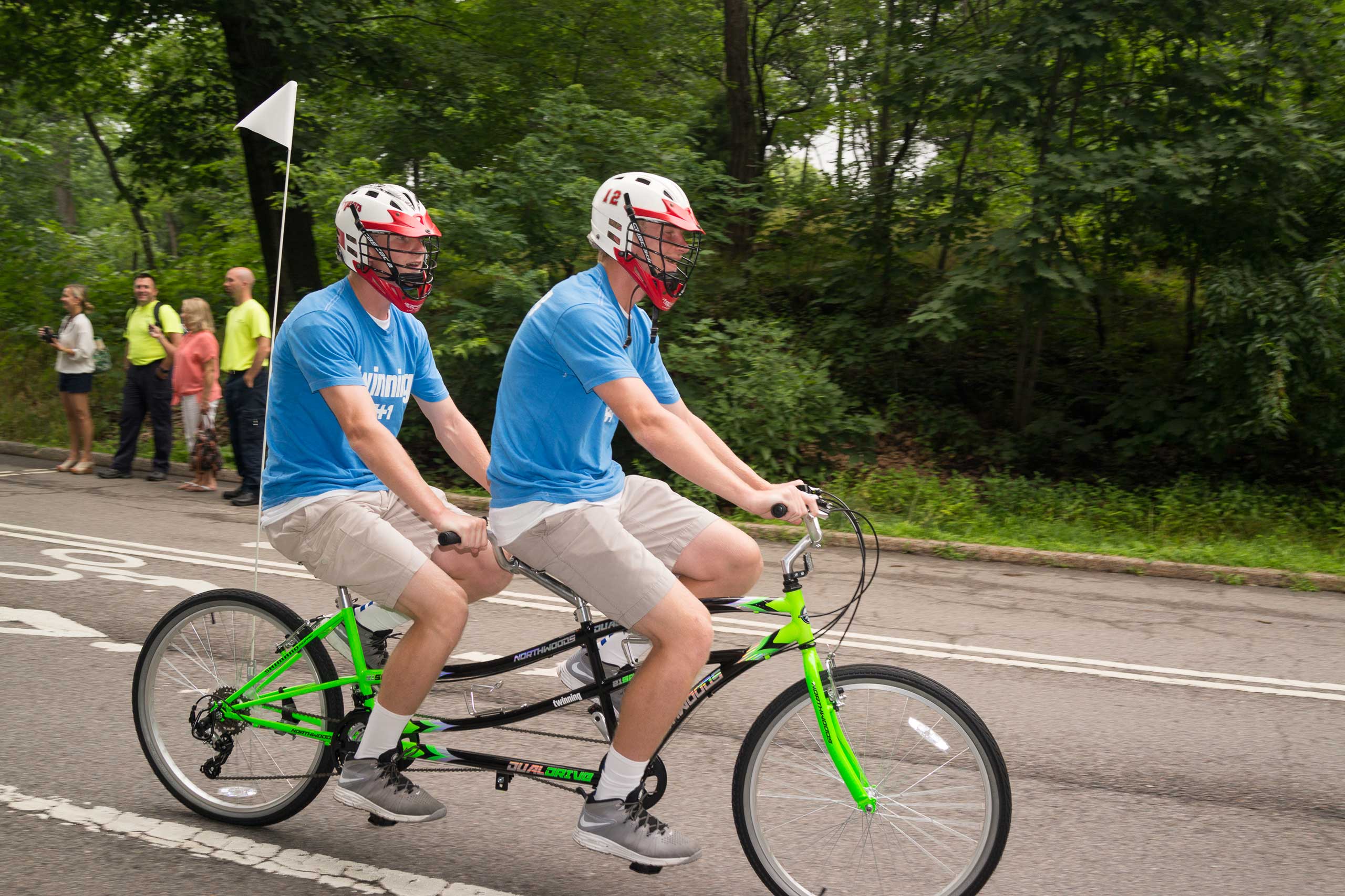 Hundreds of twins ride tandem bikes in an attempt to set the record for the most twins ever riding tandem bikes, in Central Park in New York City on July 15, 2015.
