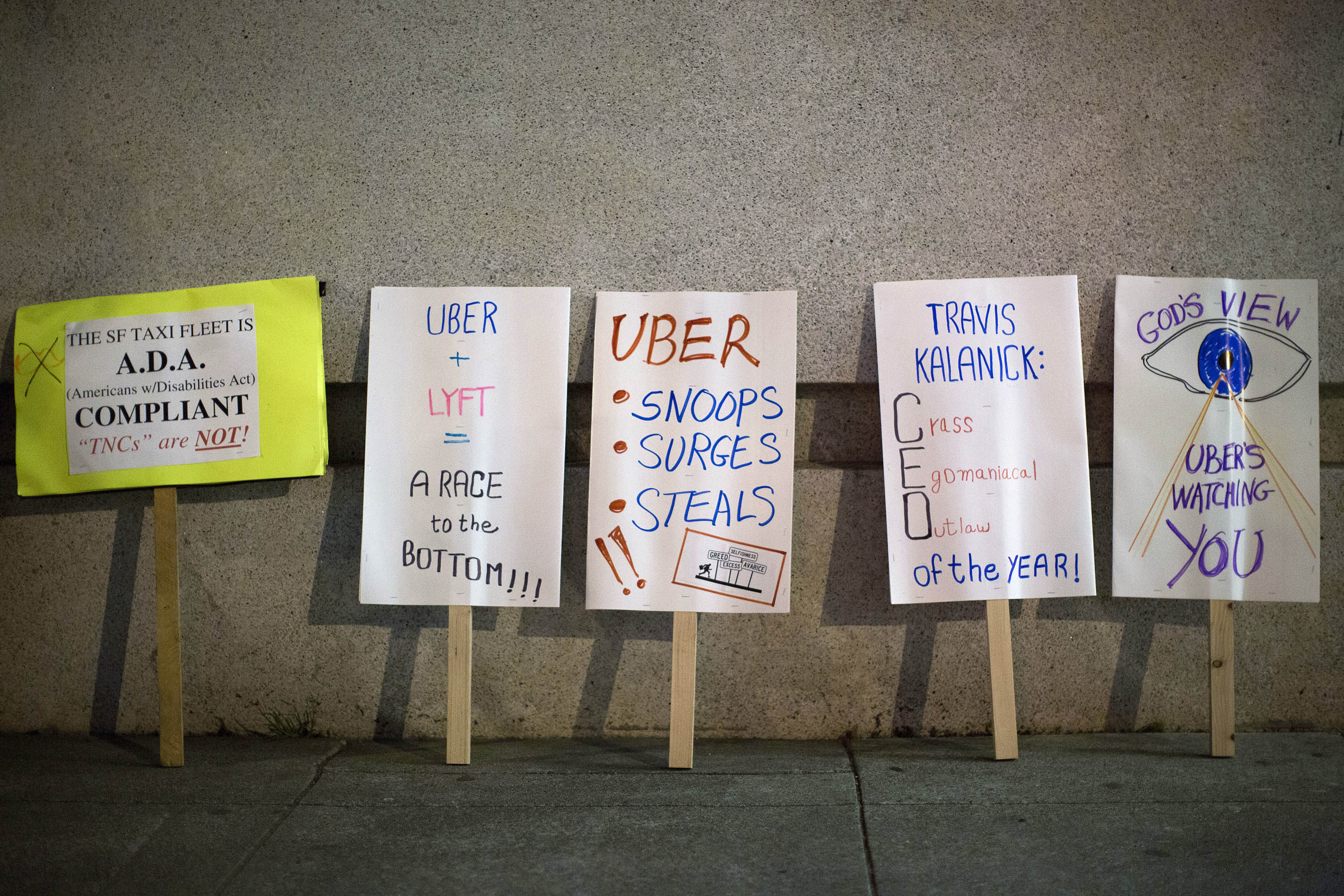 Taxi drivers have long protested Uber; now some of the startup’s drivers are joining the fight. (Stephen Lam—Reuters)