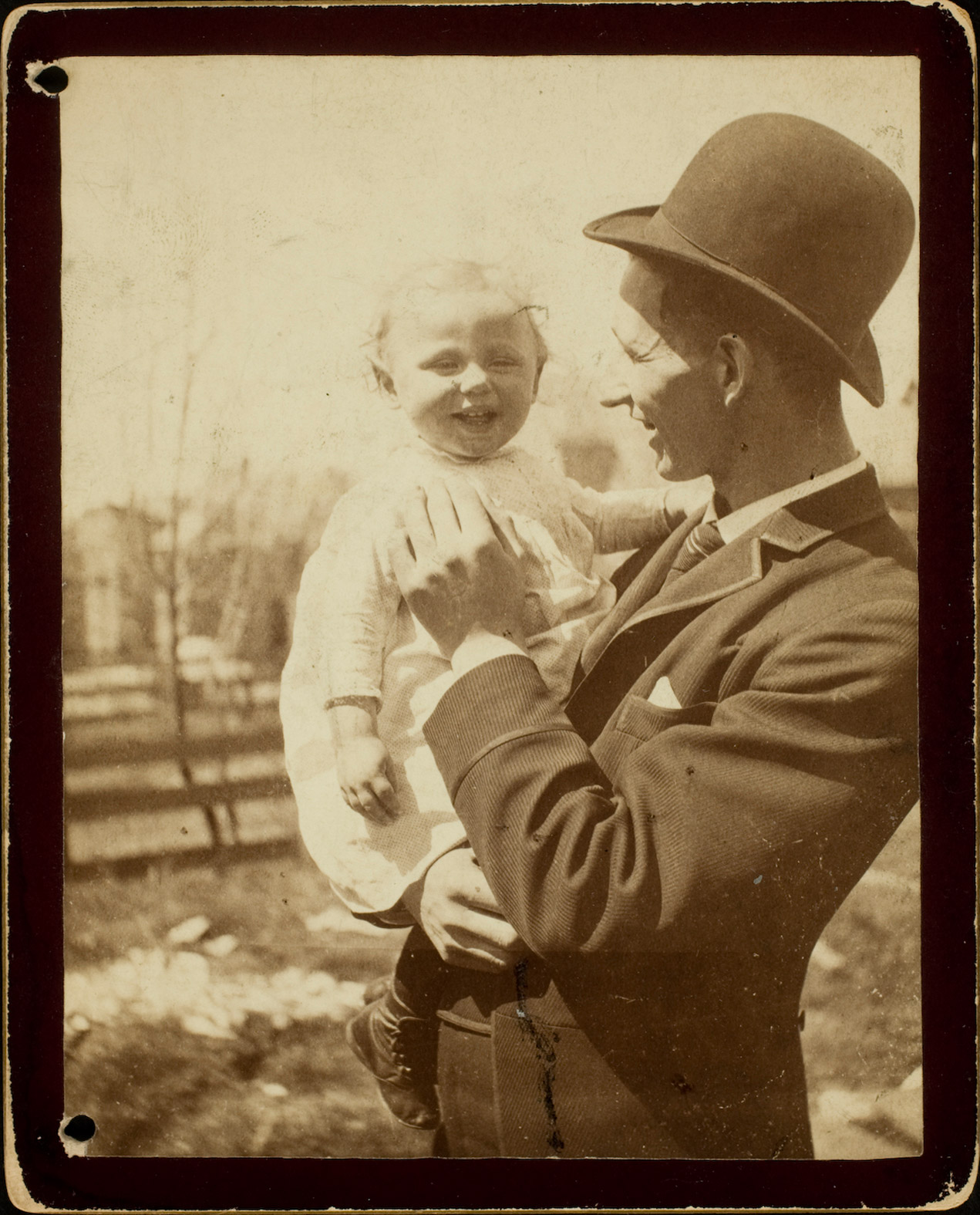 Unidentified photographer. No. 4 Kodak snapshot of Henry Meyering holding Hortense Glaser, ca. 1890. Collodion or gelatin printing out paper (POP) print. Museum Collection.