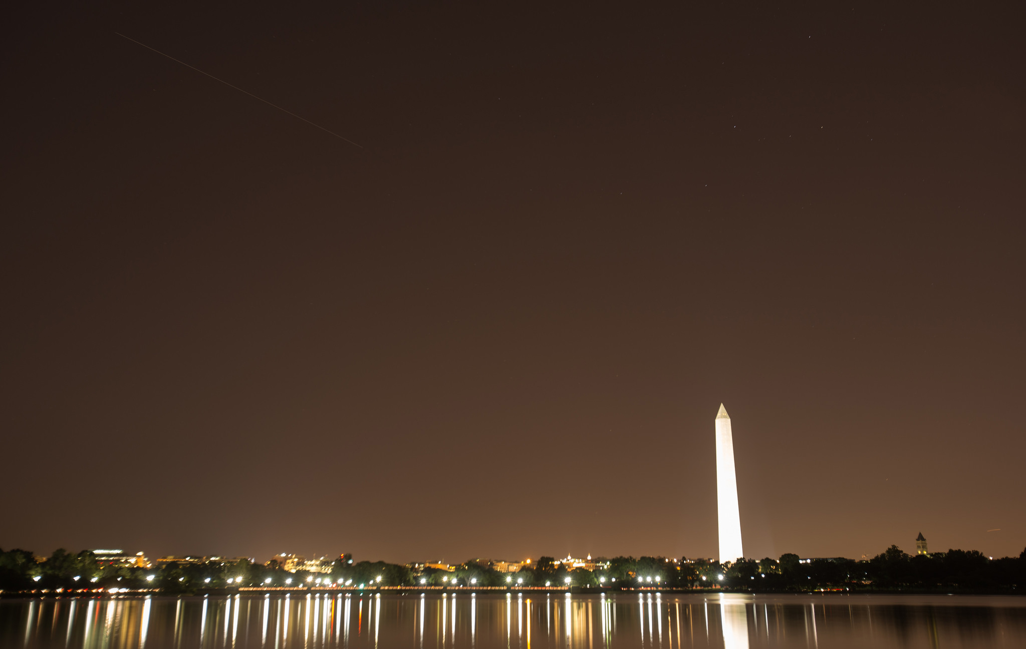The International Space Station is seen in this thirty second exposure as it flies over Washington, DC on Aug. 1, 2015.