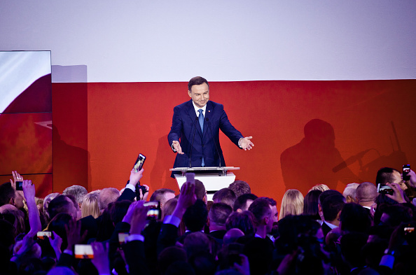 Andrzej Duda gestures to his supporters in Warsaw, Poland, on May 24, 2015 (Piotr Malecki—Bloomberg via Getty Images)
