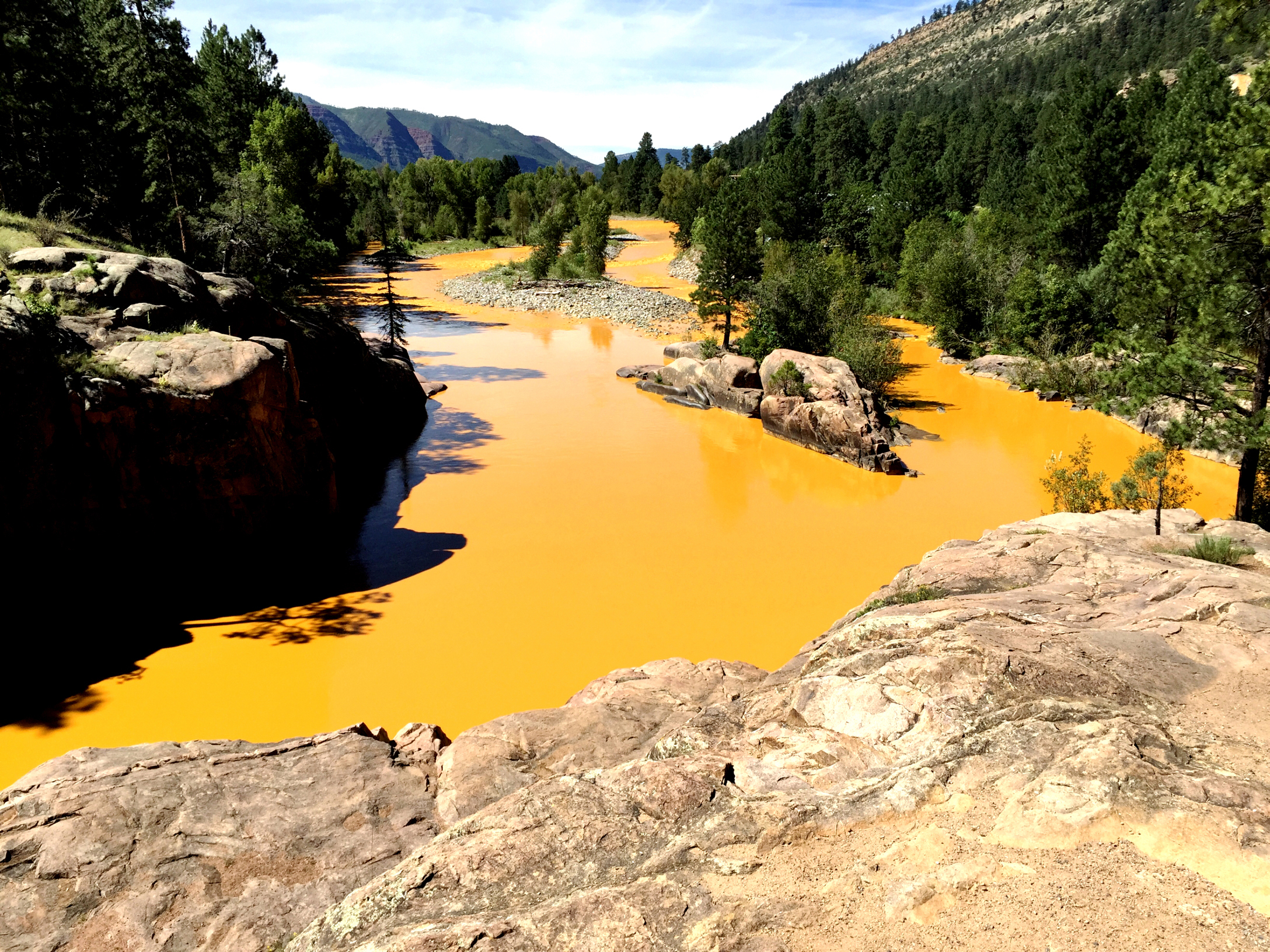 Mine waste from the Gold King Mine north of Silverton fills the Animas River at Bakers Bridge on Aug. 6, 2015 in Durango, Colo. (Jerry McBride—Durango Herald)