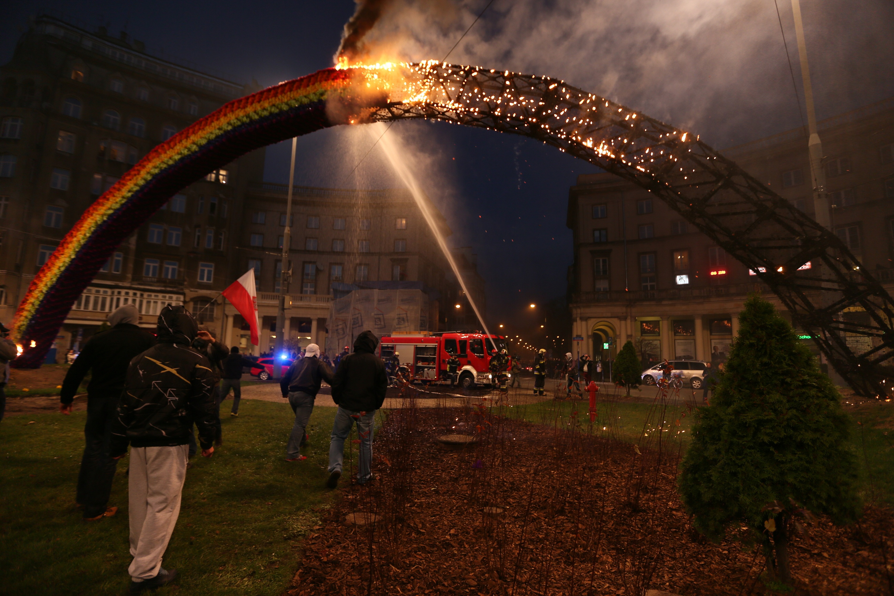 A 'Rainbow' installation is set on fire by demonstrators during the 'March of Independence' at the Savior Square in Warsaw, Poland, Nov. 11, 2013 (Jan A. Nicolas—picture-alliance/dpa/AP)