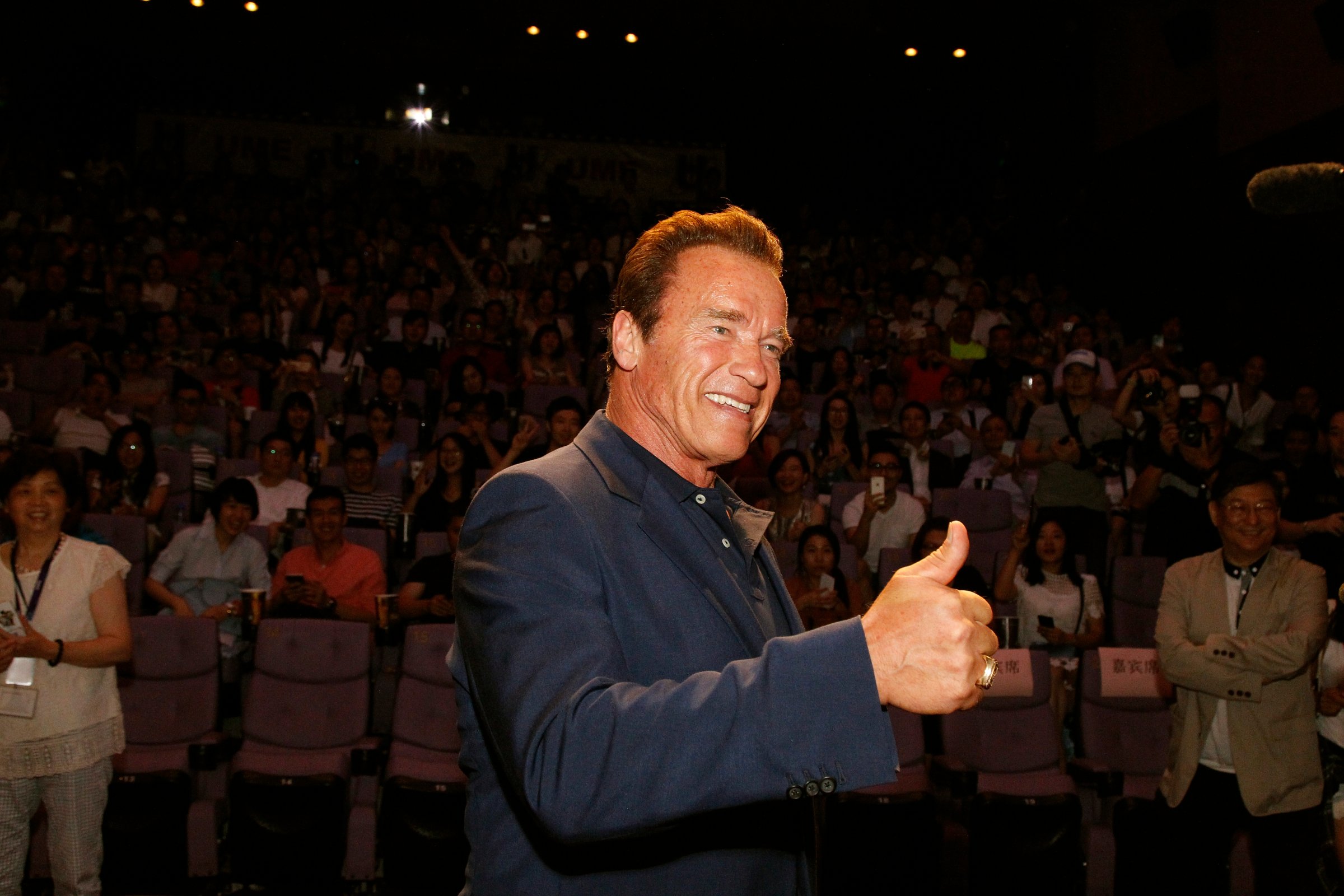 Arnold Schwarzenegger signals at a screening of the Terminator: Genisys on August 18, 2015 in Shanghai, China.