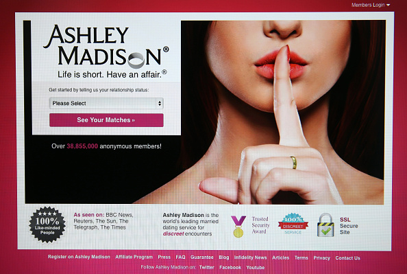 LONDON, ENGLAND - AUGUST 19:  The Ashley Madison website is displayed on August 19, 2015 in London, England. Hackers who stole customer information from the cheating site AshleyMadison.com dumped 9.7 gigabytes of data to the dark web on Tuesday fulfilling a threat to release sensitive information including account details, log-ins and credit card details, if Avid Life Media, the owner of the website didn't take Ashley Madison.com offline permanently.  (Photo by Carl Court/Getty Images)