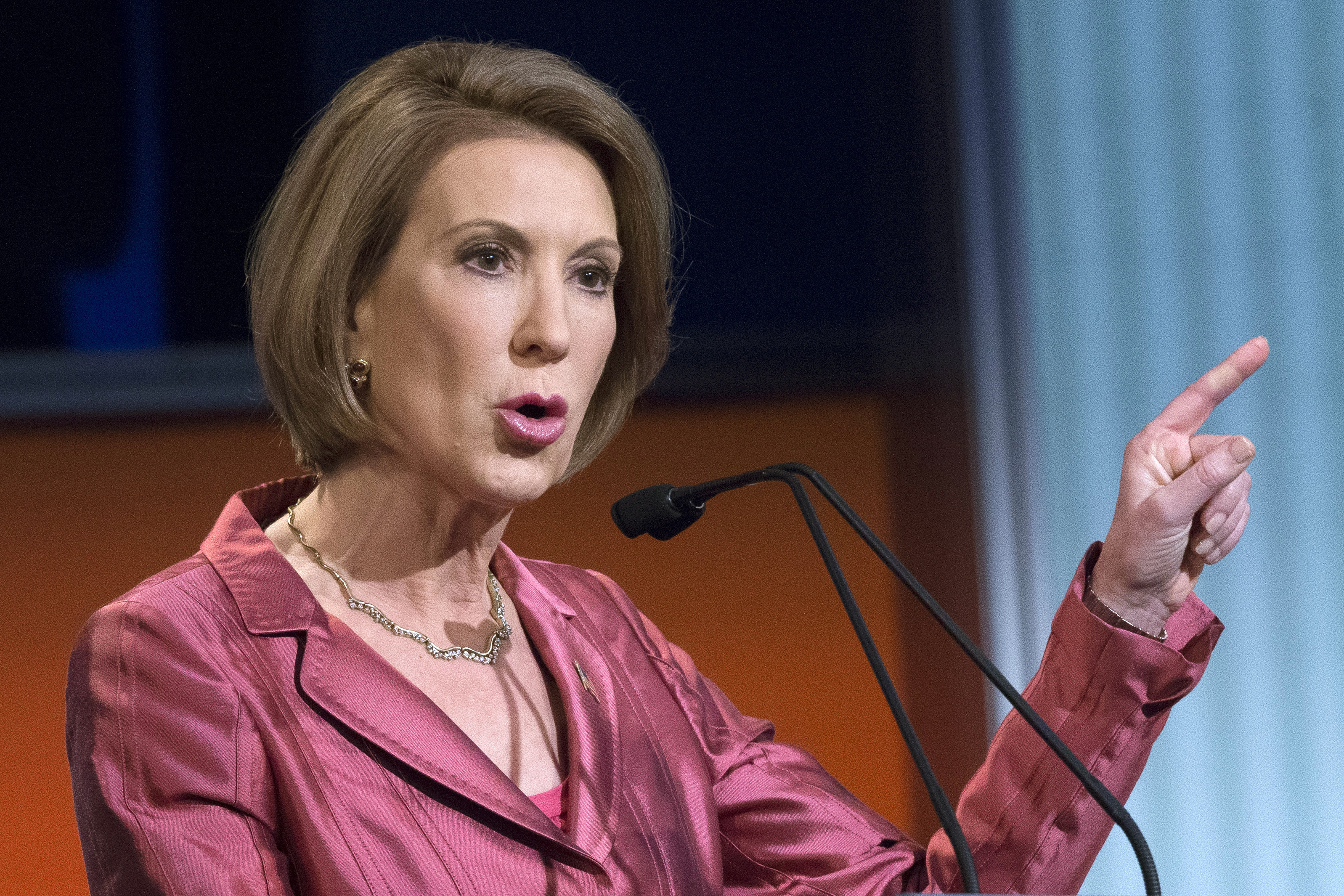 Republican presidential candidate Carly Fiorina speaks during a predebate forum in Cleveland on Aug. 6, 2015 (John Minchillo—AP)