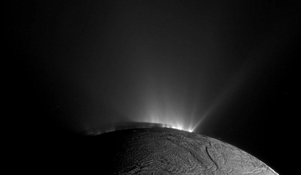 This Cassini narrow-angle camera image -- one of those acquired in the survey conducted by the Cassini imaging science team of the geyser basin at the south pole of Enceladus -- was taken as Cassini was looking across the moon's south pole. At the time, the spacecraft was essentially in the moon's equatorial plane. The image scale is 1280 feet (390 meters) per pixel and the sun-Enceladus-spacecraft, or phase, angle is 162.5 degrees.The image was taken through the clear filter of the narrow angle camera on Nov. 30, 2010, 1.4 years after southern autumnal equinox. The shadow of the body of Enceladus on the lower portions of the jets is clearly seen.In an annotated version of the image, the colored lines represent the projection of Enceladus' shadow on a plane normal to the branch of the Cairo fracture (yellow line), normal to the Baghdad fracture (blue line) and normal to the Damascus fracture (pink line).Post-equinox images like this, clearly showing the different projected locations of the intersection between the shadow and the curtain of jets from each fracture, were useful for scientists in checking the triangulated positions of the geysers, as described in a paper by Porco, DiNino, and Nimmo, and published in the online version of the Astronomical Journal in July 2014: http://dx.doi.org/10.1088/0004-6256/148/3/45.A companion paper, by Nimmo et al. is available at: http://dx.doi.org/10.1088/0004-6256/148/3/46.The Cassini-Huygens mission is a cooperative project of NASA, the European Space Agency and the Italian Space Agency. NASA's Jet Propulsion Laboratory, a division of the California Institute of Technology in Pasadena, manages the mission for NASA's Science Mission Directorate, Washington. The Cassini orbiter and its two onboard cameras were designed, developed and assembled at JPL. The imaging operations center is based at the Space Science Institute in Boulder, Colorado.For more information about the Cassini-Huygens mission visit http://saturn.j