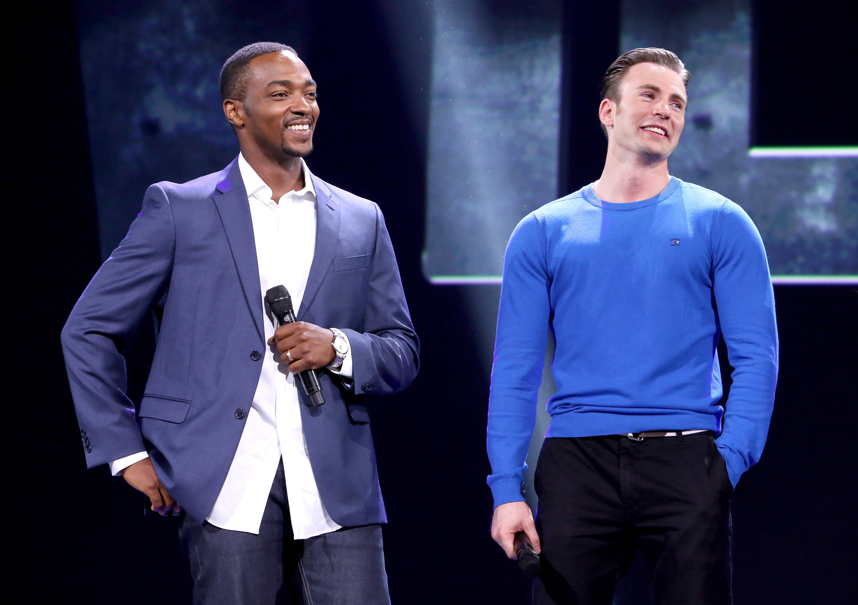 Actors Anthony Mackie, left, and Chris Evans of C<i>Captain America: Civil War</i> took part in "Worlds, Galaxies, and Universes: Live Action at The Walt Disney Studios" presentation at Disney's D23 EXPO 2015 in Anaheim, Calif., on Aug. 15, 2015. (Jesse Grant—Getty Images)