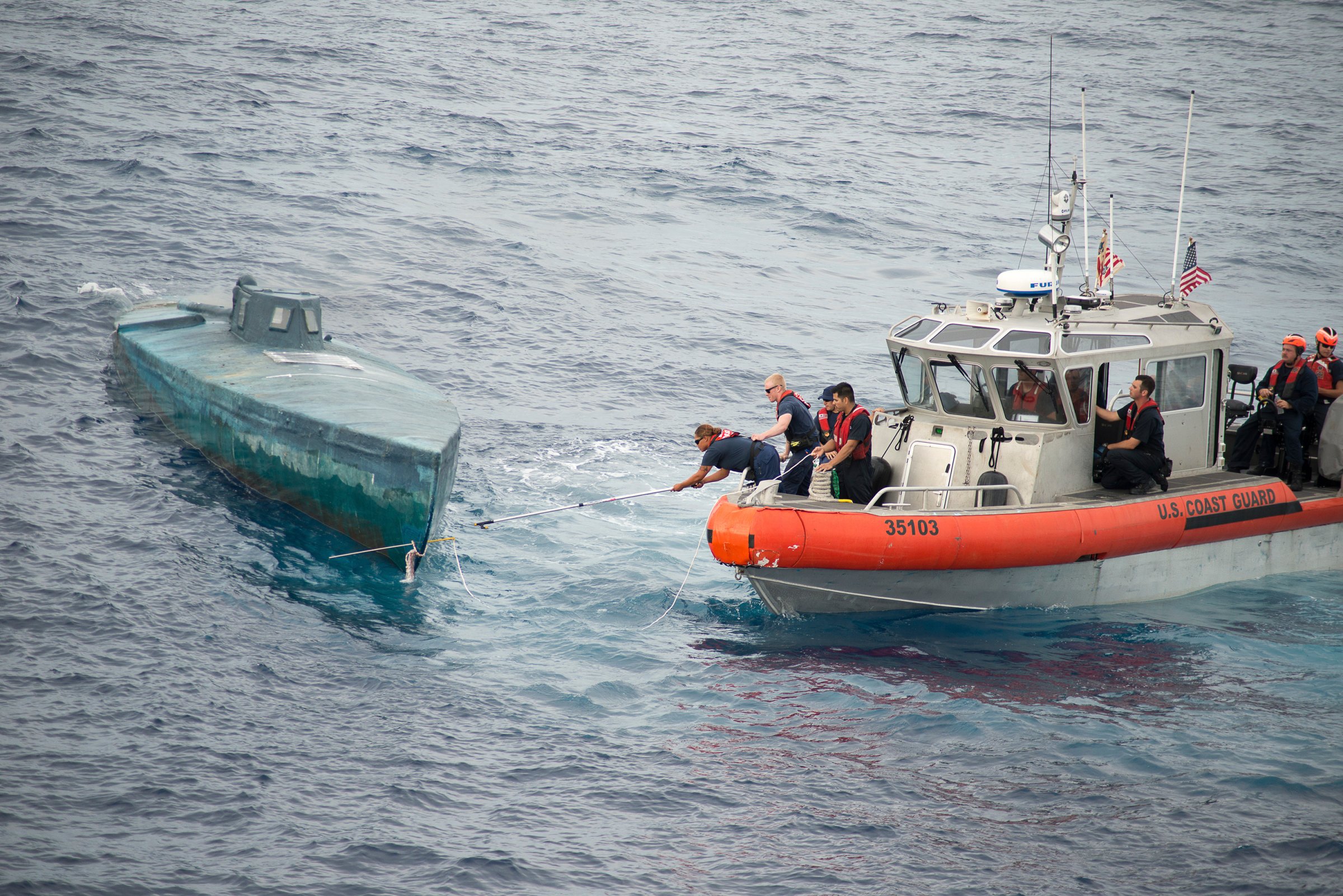 Crew from the U.S. Coast Guard Cutter Stratton stop a Self-Propelled Semi Submersible off the coast of Central America in this U.S. Coast Guard picture taken July 18, 2015 and released August 5, 2015.
