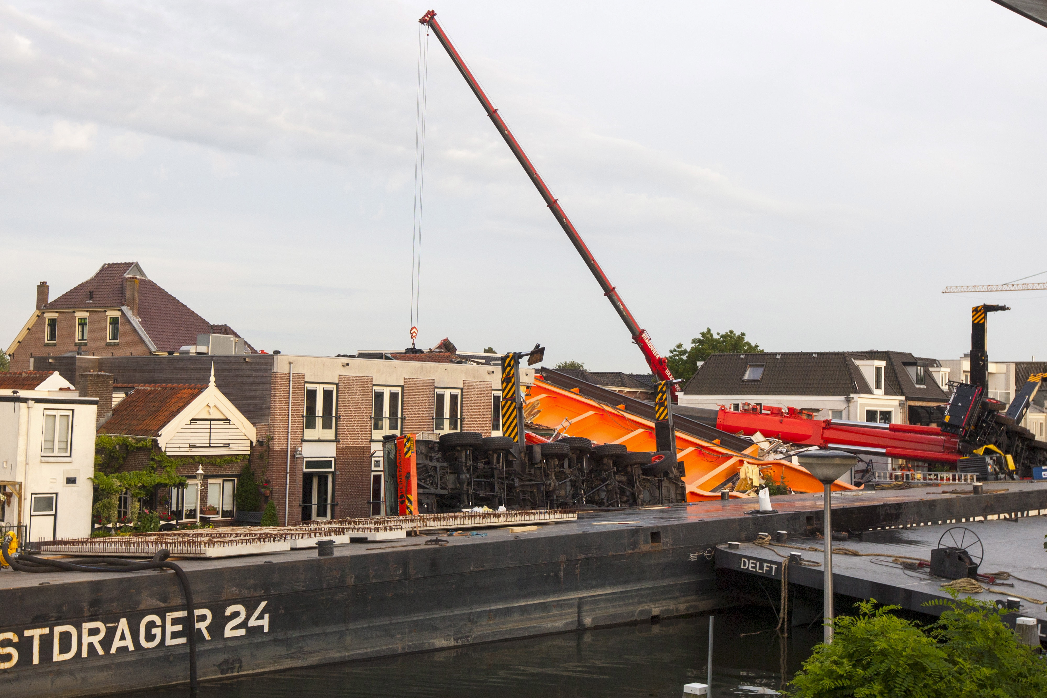 Two collapsed cranes are seen in Alphen aan de Rijn, the Netherlands