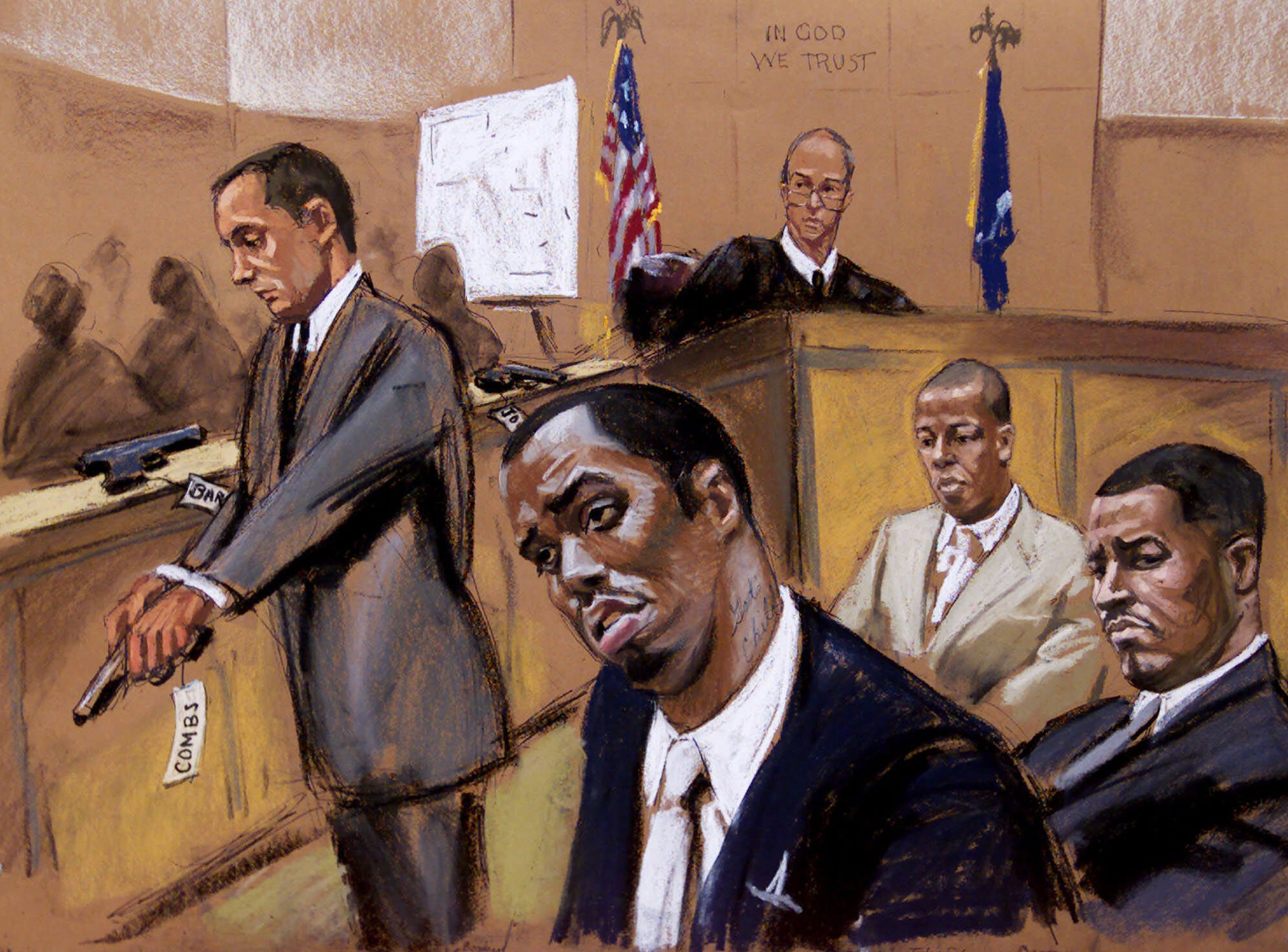 Assistant District Attorney Matthew Bogdanos holds a gun during his final summation to the jury in the trial of Sean  Puffy  Combs on March 13, 2001 in New York. Combs was was acquitted of weapon possession and attempted bribery charges in a case stemming from a 1999 shooting at a New York dance club.