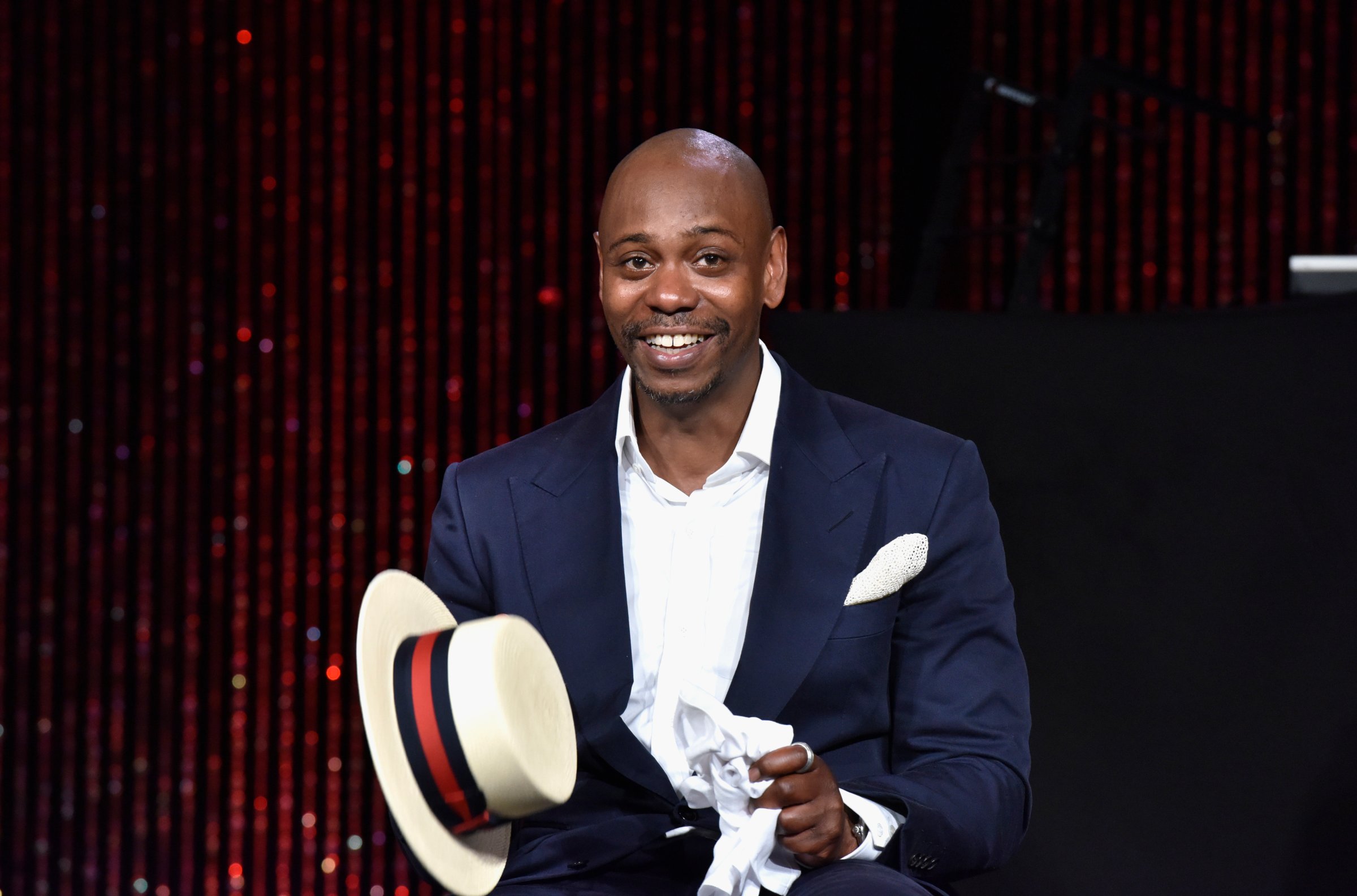 Dave Chappelle speaks on stage as RUSH Philanthropic Arts Foundation Celebrates its 20th Anniversary at Fairview Farms on July 18, 2015 in Water Mill, New York.