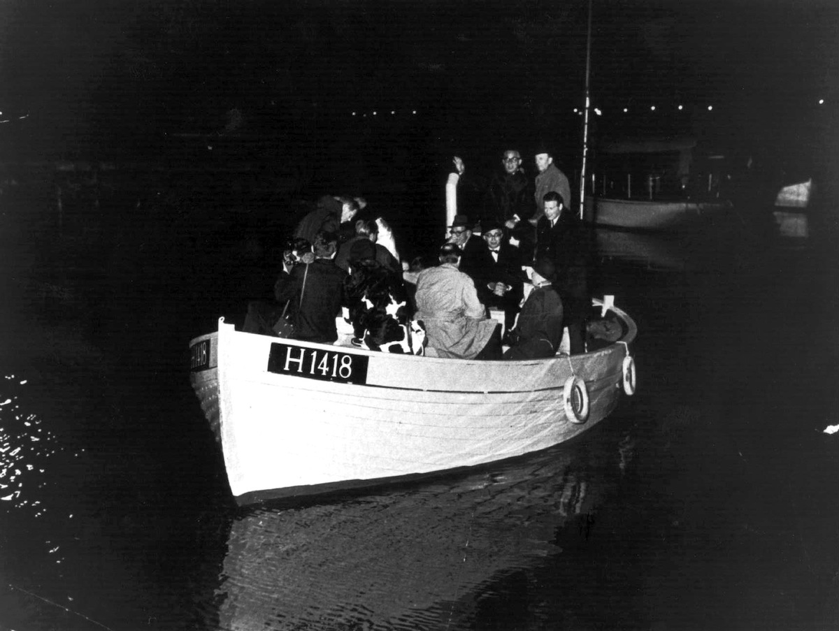 This 1943 photo shows a boat carrying people during the escape across the Oresound of some of 7,000 Danish Jews who fled to safety in neighboring Sweden (AFP/Getty Images)