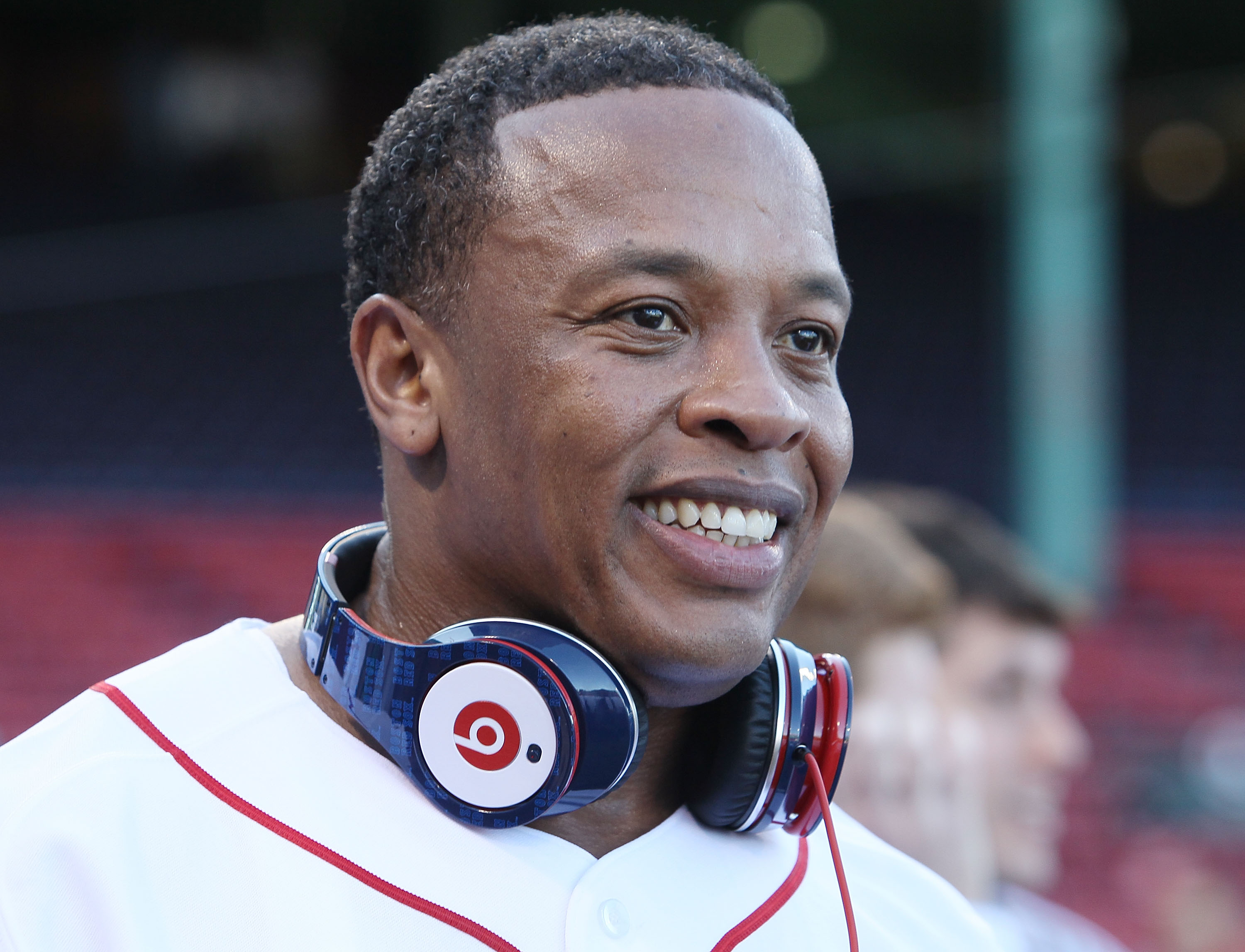 Producer and musician Dr. Dre is on the field before the Boston Red Sox take on the the New York Yankees on April 4, 2010. (Elsa—Getty Images)