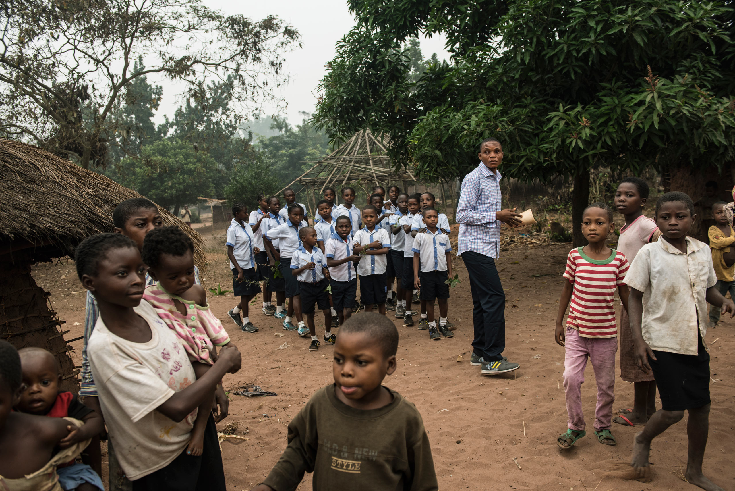 Congolese children attend the Brilliant Mobile School in the village of Lungudi,  Kasaï. The school's program uses funds from the diamond industry to educate miners' children. Aug. 7, 2015. (Lynsey Addario—Getty Images Reportage for TIME)