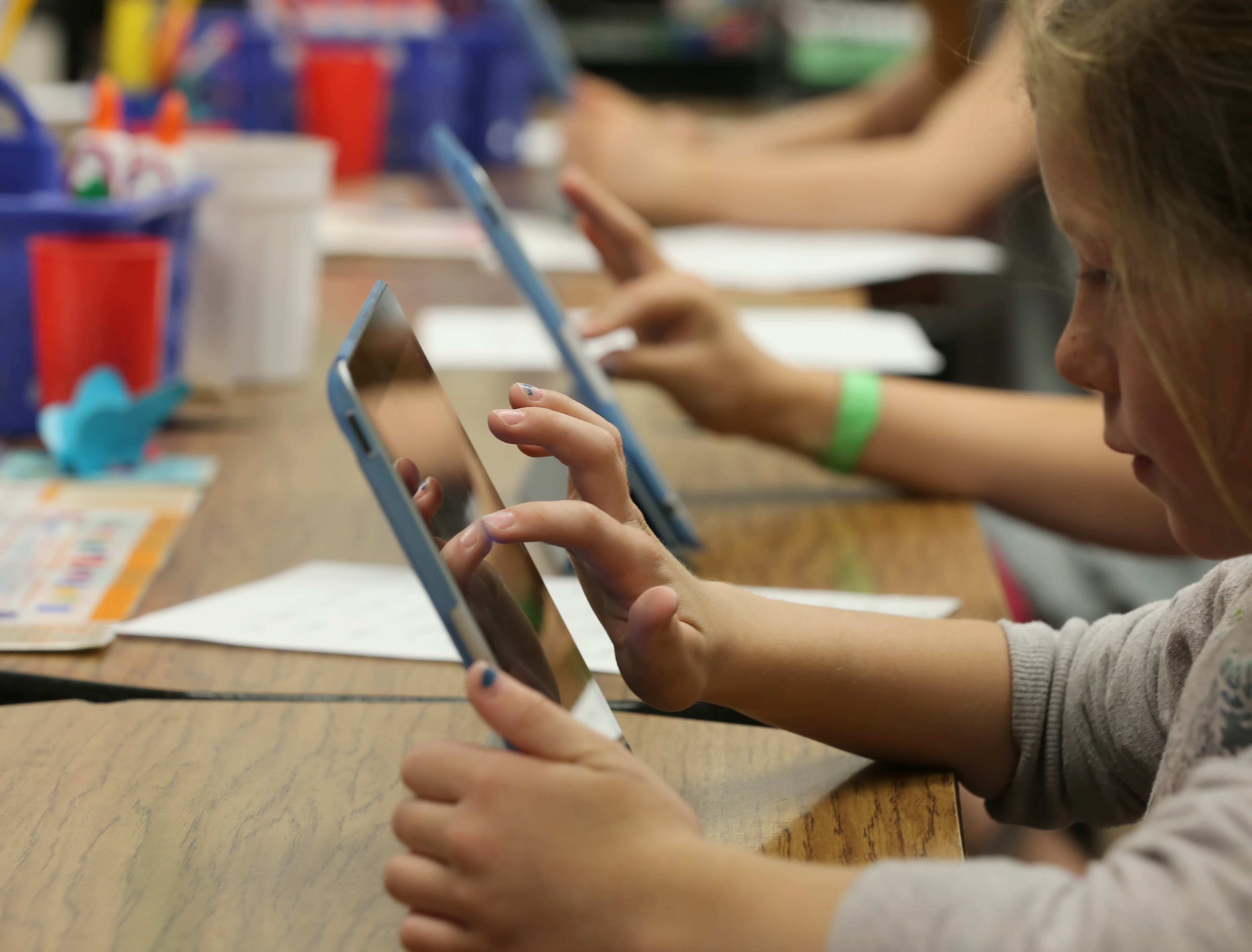 Second graders work on Apple Inc. iPads as part of their classroom work at Park Lane Elementary school, in the Canyons School District, in Sandy, Utah, U.S. on Monday, May 20, 2013. (Bloomberg&mdash;Bloomberg via Getty Images)