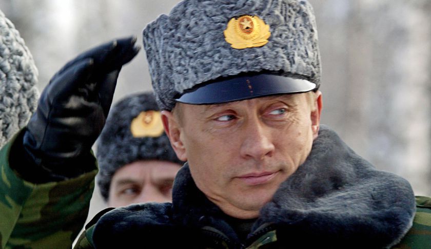 Russian President Vladimir Putin salutes