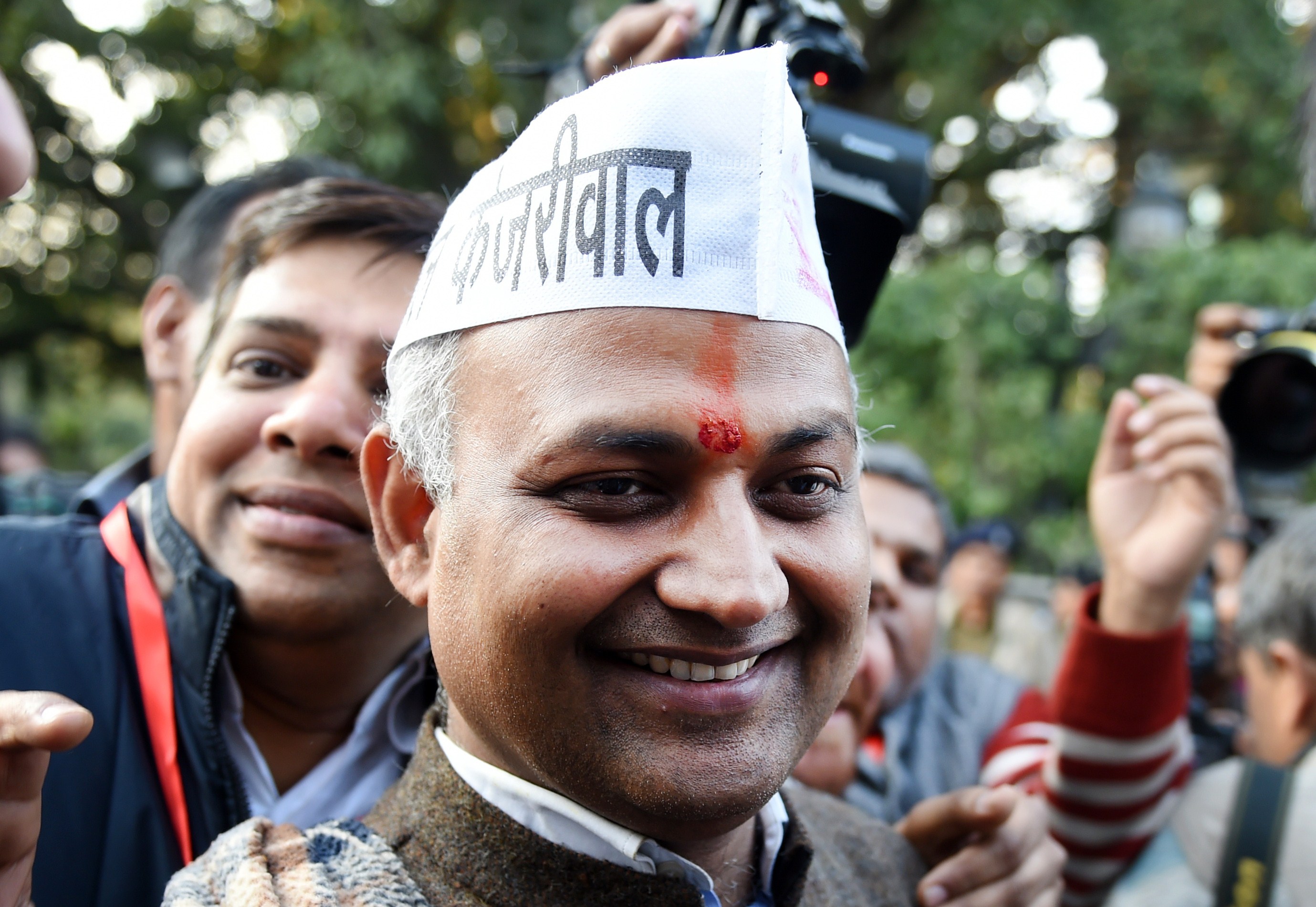 Senior Leader of India's Aam Aadmi Party (AAP) Somnath Bharti (C) arrives for a meeting in New Delhi on February 10, 2015. (SAJJAD HUSSAIN—AFP/Getty Images)