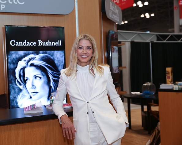 Author Candace Bushnell poses for photographs with her newest book during BookCon held at the Javits Center on May 31, 2015 in New York City (Brent N. Clarke—FilmMagic/Getty Images)