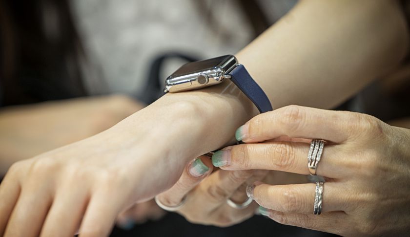 A customer tries on an Apple Watch. (Bloomberg&mdash;Bloomberg via Getty Images)