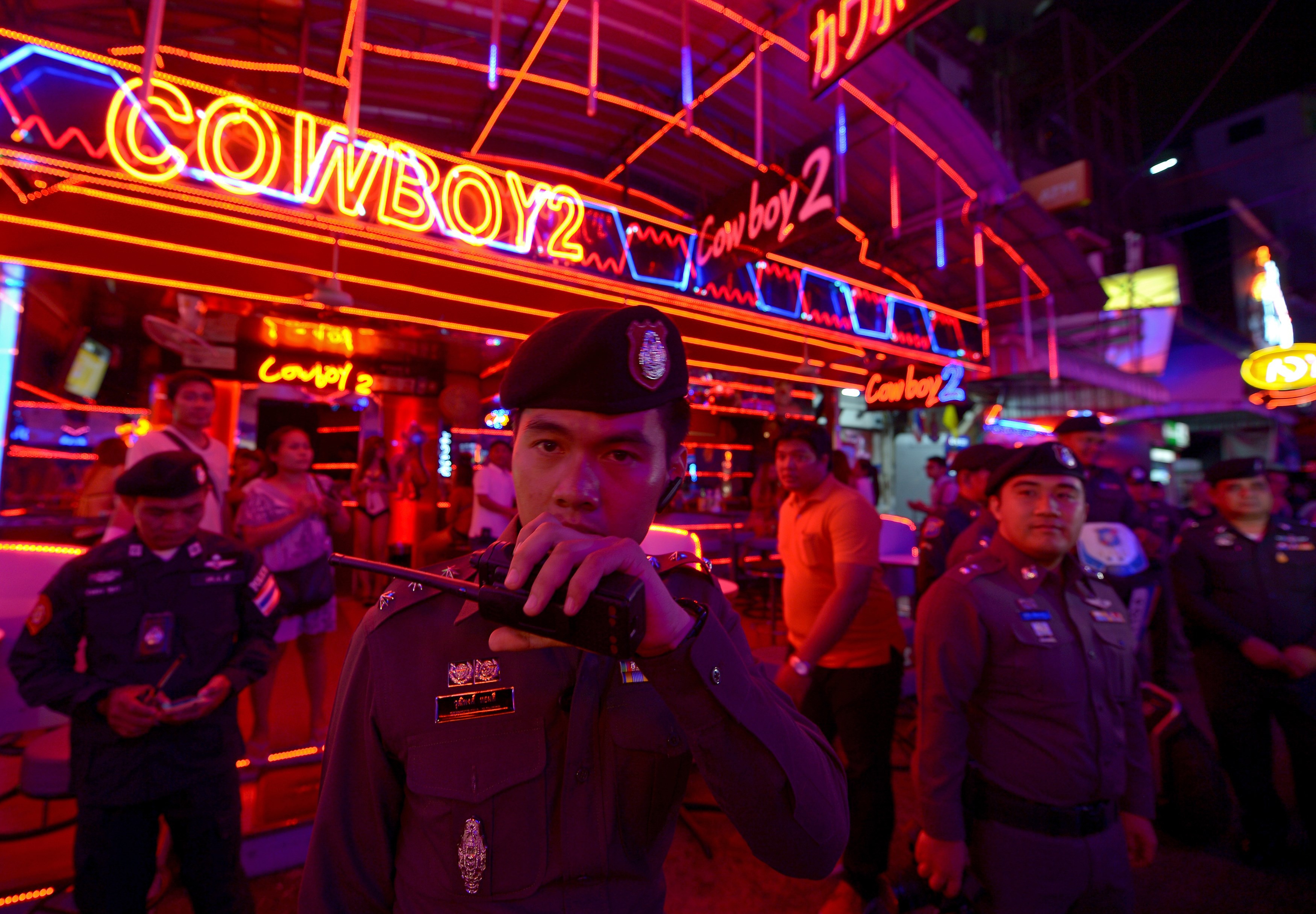 Thai policemen check security at bars in the tourist area of Bangkok on August 19, 2015. (Pornchai Kittiwongsakul—AFP/Getty Images)