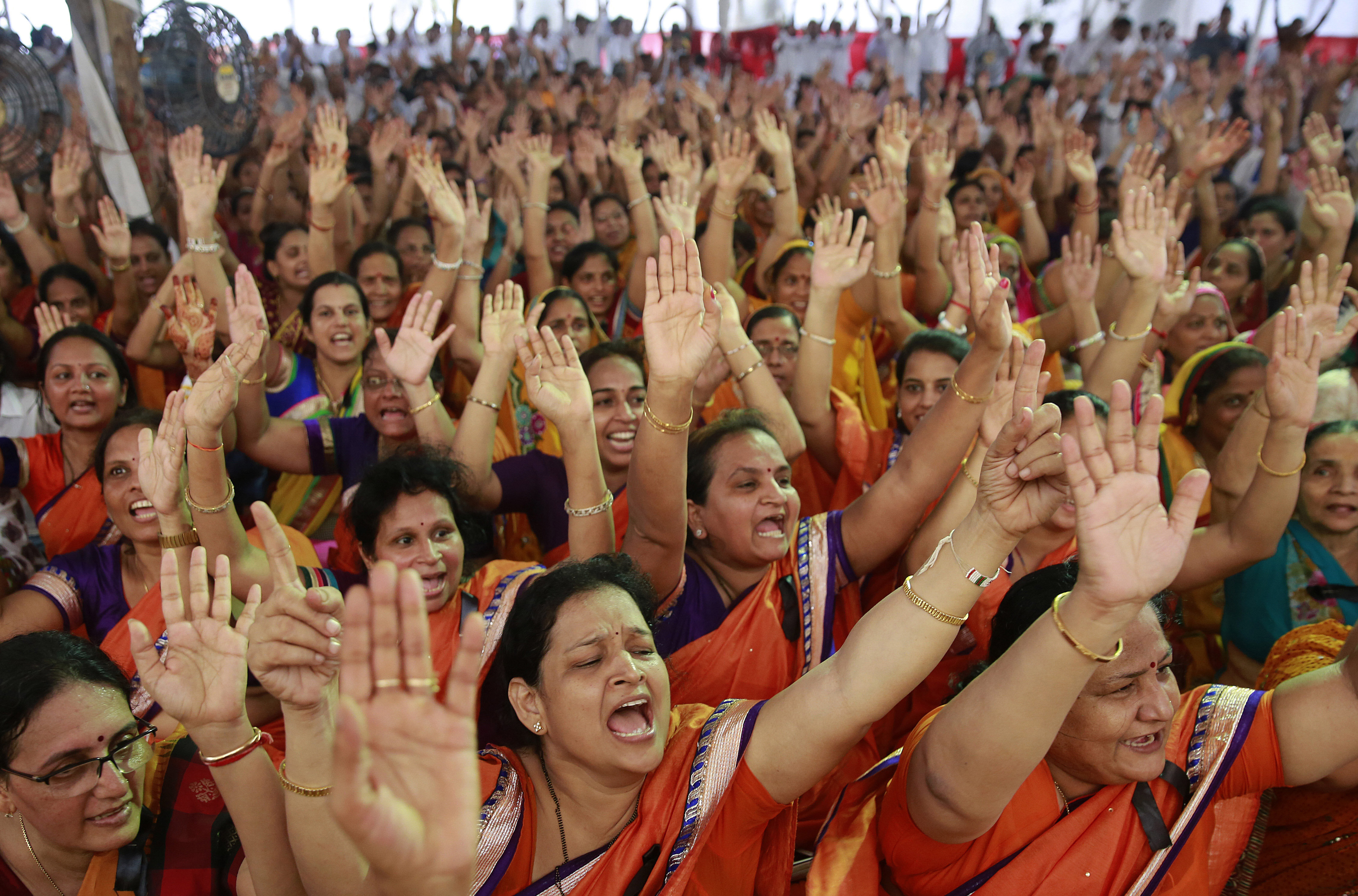 Members of the Jain community shout slogans during a protest of the recent Rajasthan High Court order banning the religious practice of Santhara, a practice of fasting unto death, in Mumbai on Aug. 24, 2015. (Rafiq Maqbool—AP)