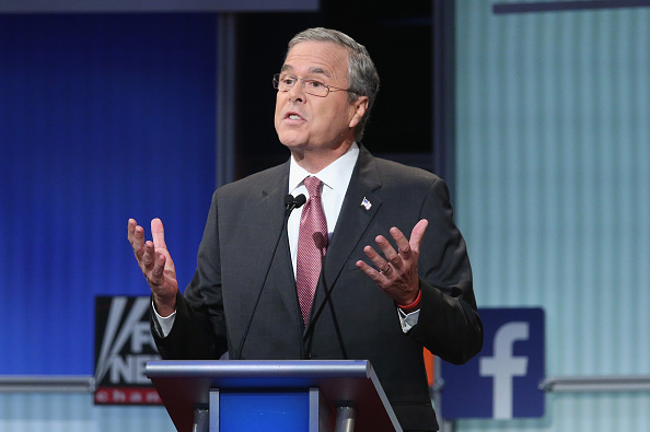 Republican presidential candidate Jeb Bush fields a question during the first Republican presidential debate hosted by Fox News and Facebook at the Quicken Loans Arena on August 6, 2015 in Cleveland, Ohio.