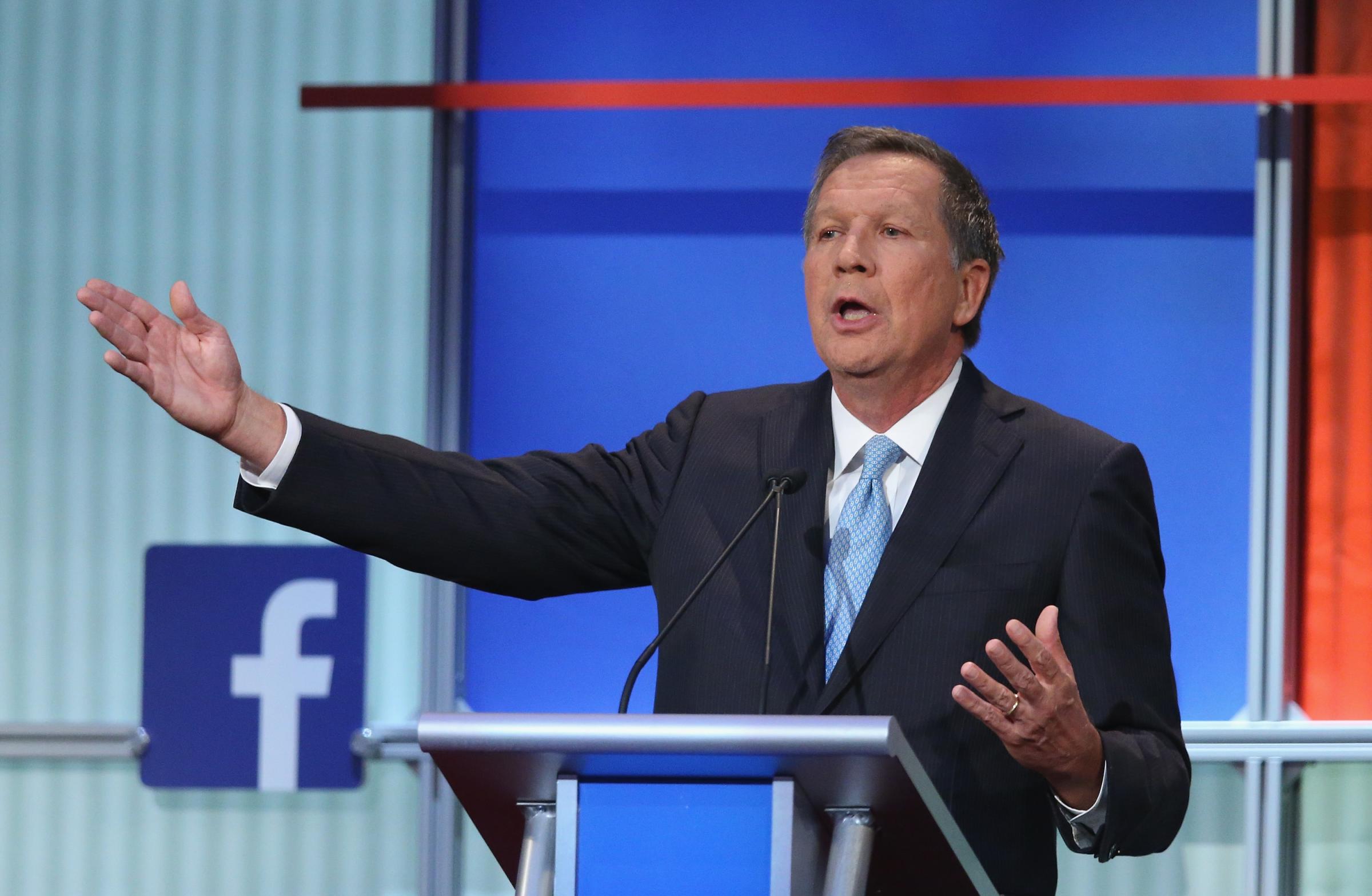 Republican presidential candidate Ohio Gov. John Kasich fields a question during the first Republican presidential debate hosted by Fox News and Facebook at the Quicken Loans Arena in Cleveland, Ohio, on Aug. 6, 2015.