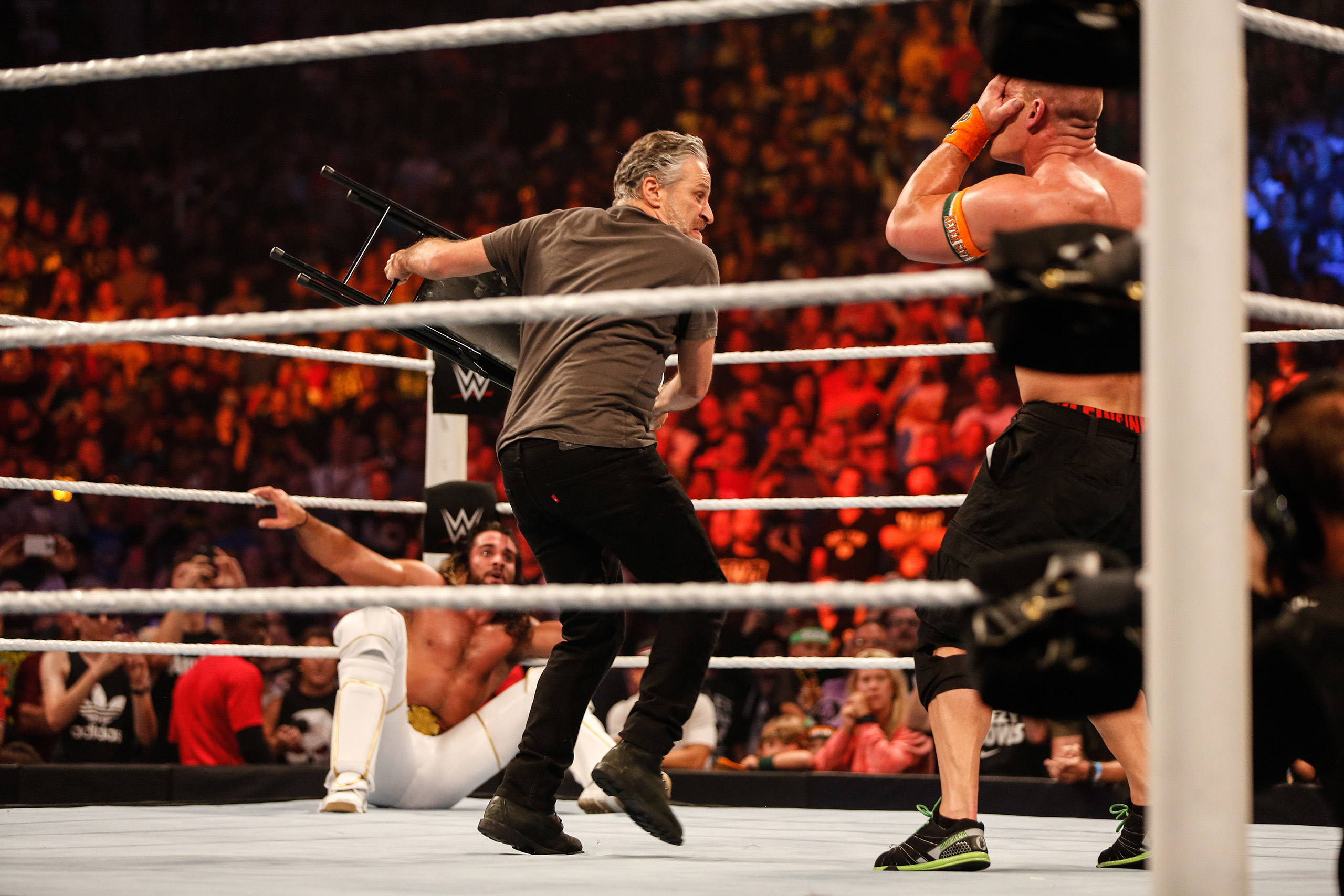 NEW YORK, NY - AUGUST 23:  Jon Stewart gets into the action at WWE SummerSlam 2015 Barclays Center of Brooklyn on August 23, 2015 in New York City.  (Photo by JP Yim/Getty Images)