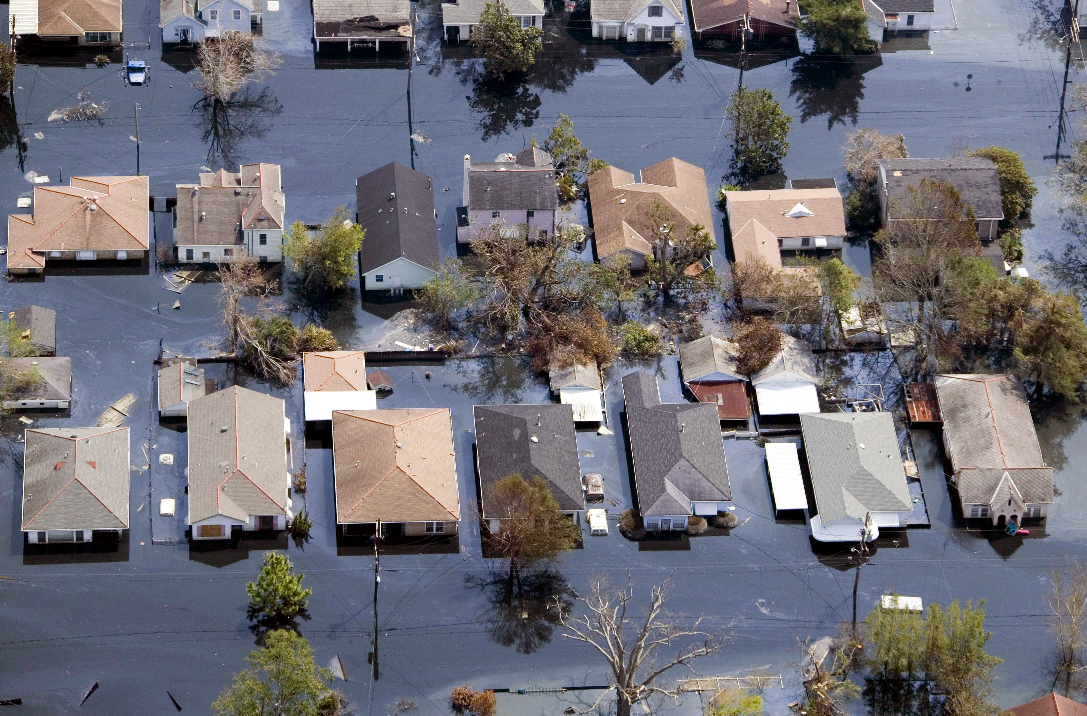 Houses lie flooded from Hurricane Katrina in the Gentilly neighborhood of New Orleans, Louisiana on Sept. 11, 2005. (Jerry Grayson—Getty Images)